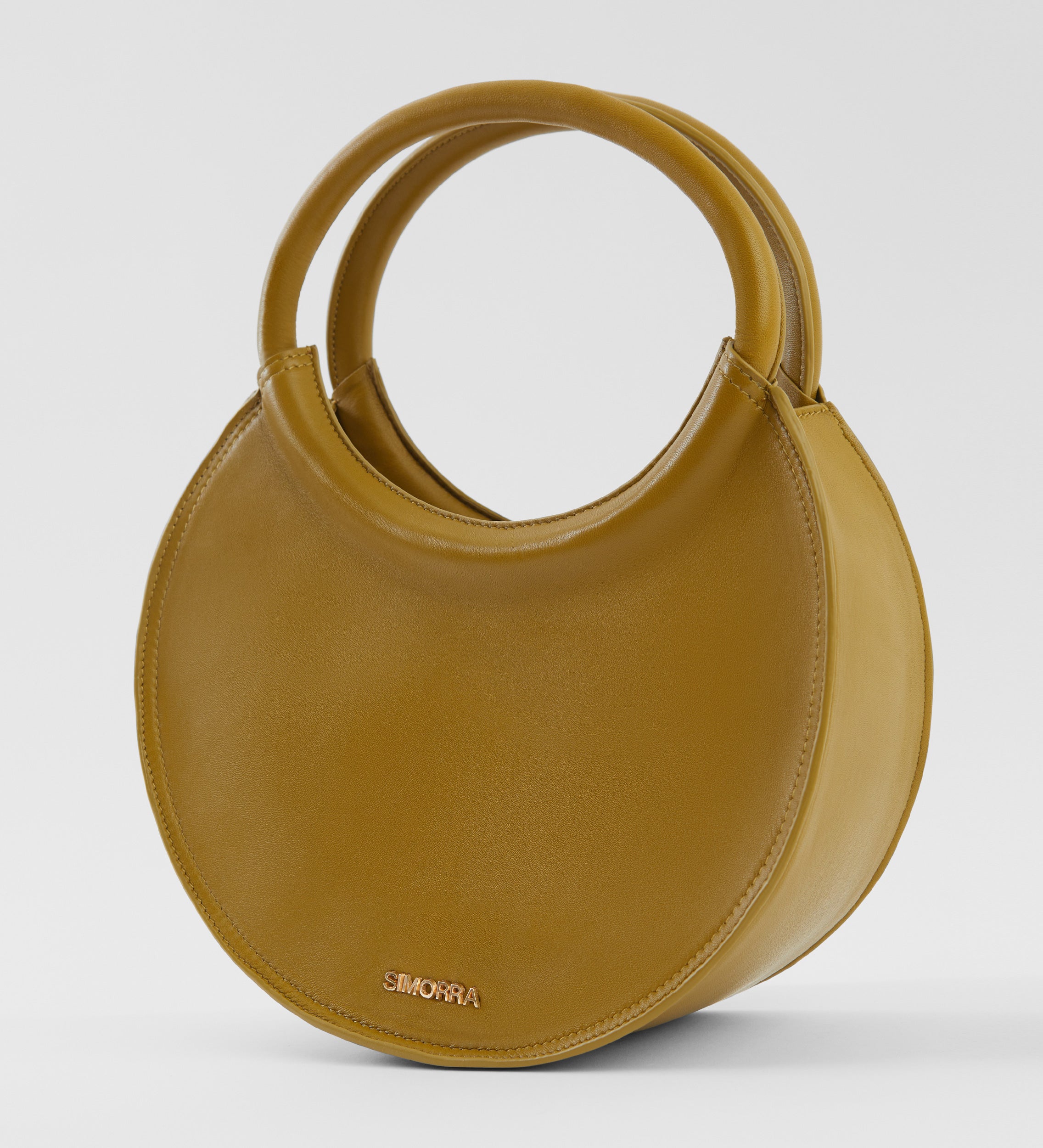 Circular leather bag