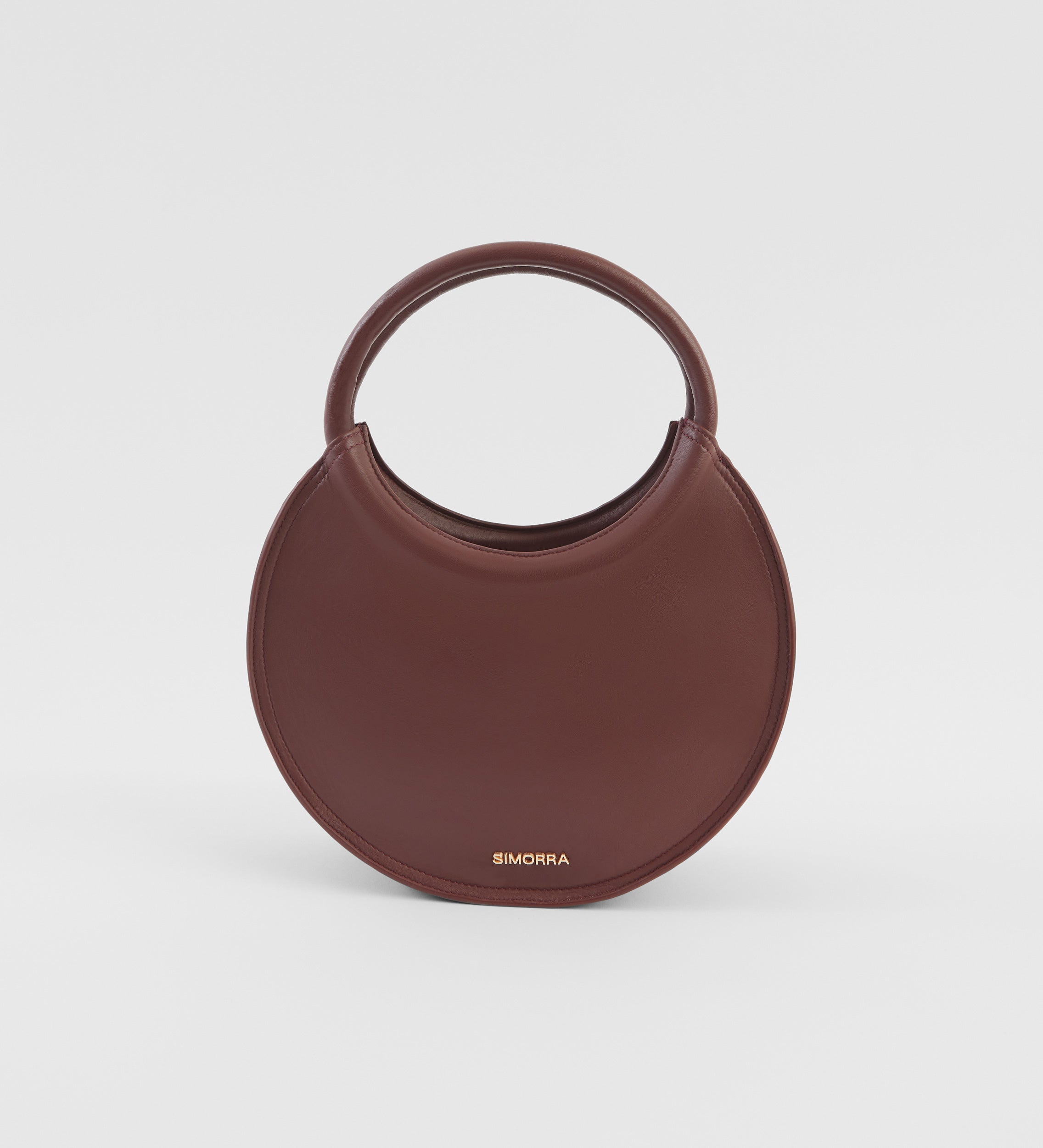 Bolso circular piel