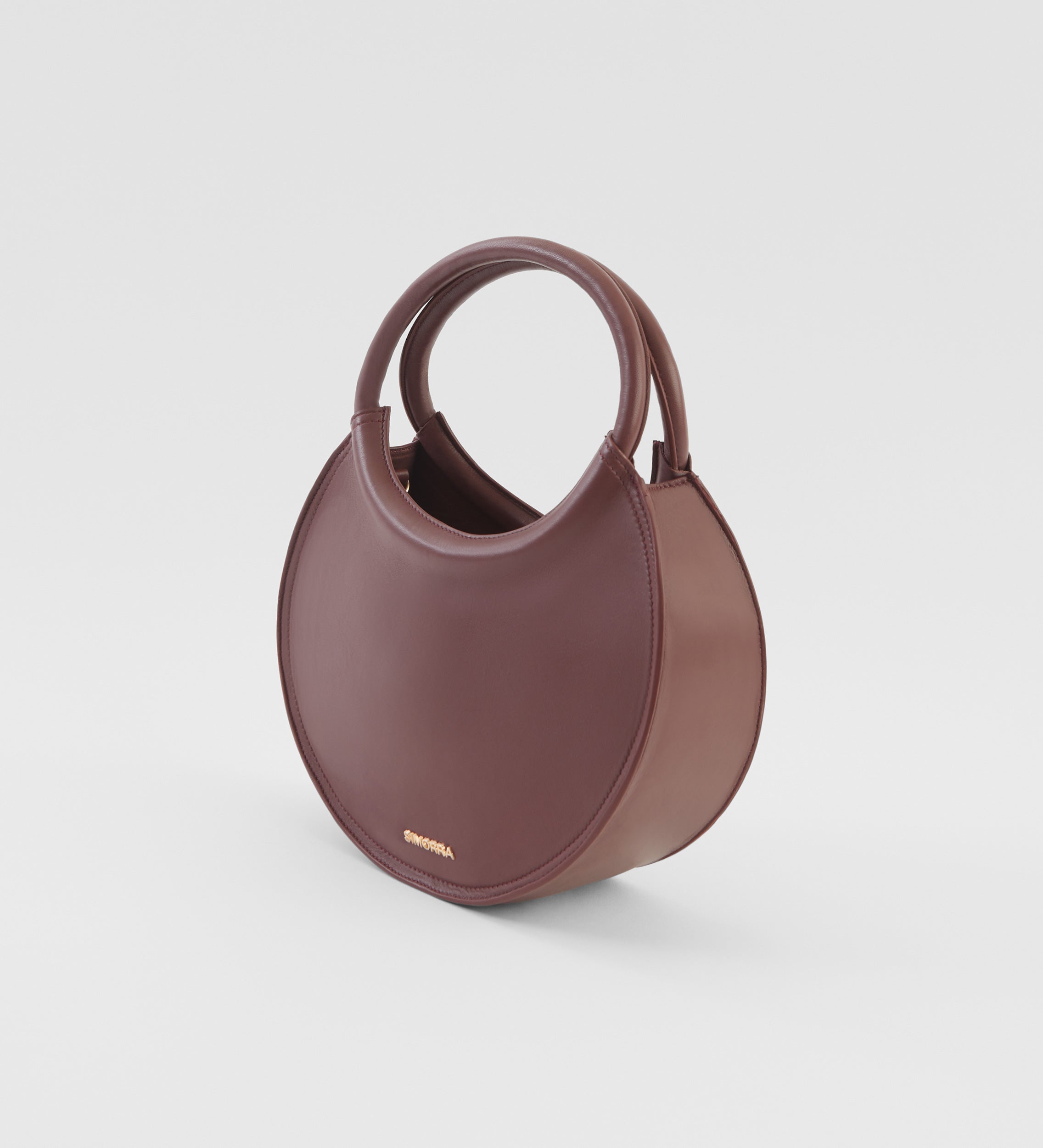 Circular leather bag