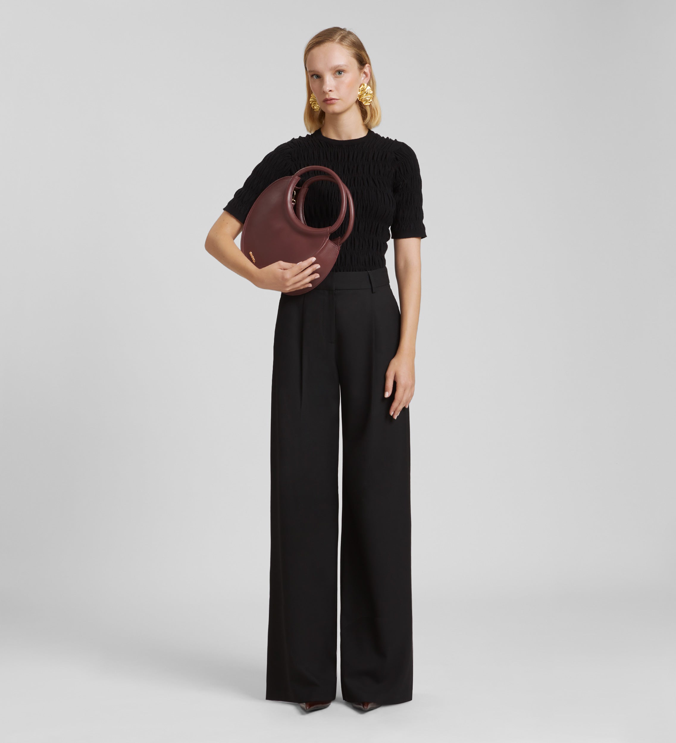 Wide pleated trousers