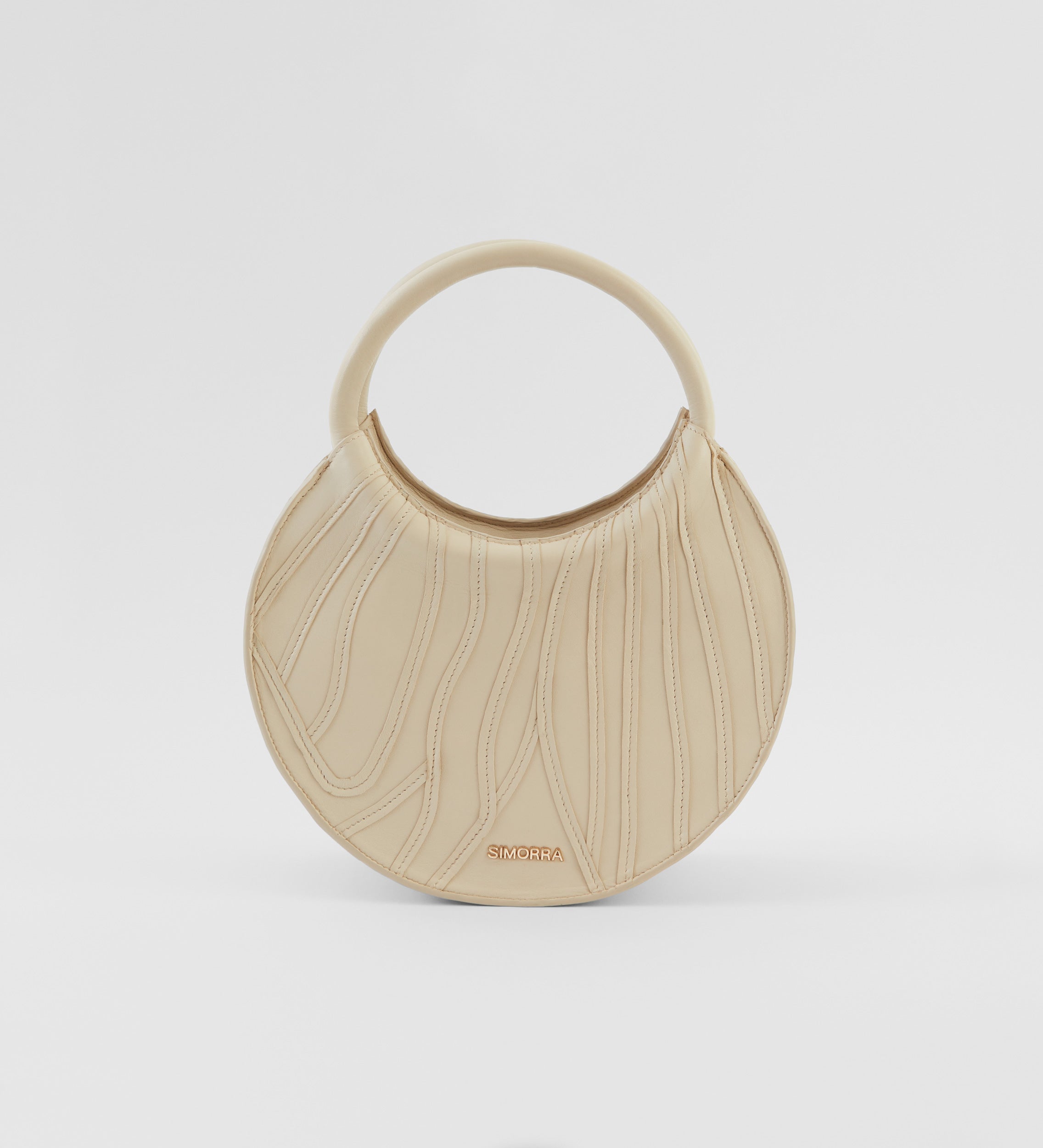 Circular leather bag