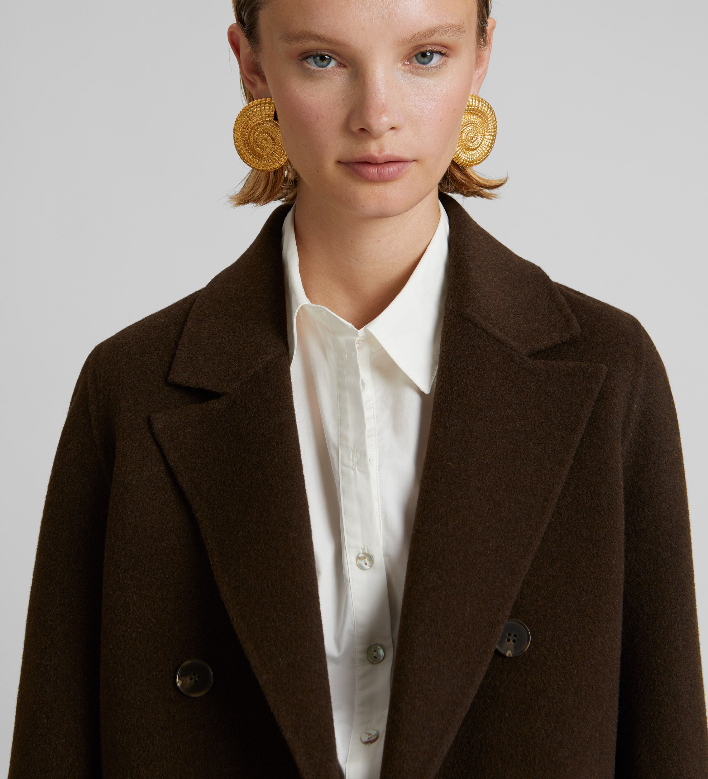 Manteau long à double boutonnage