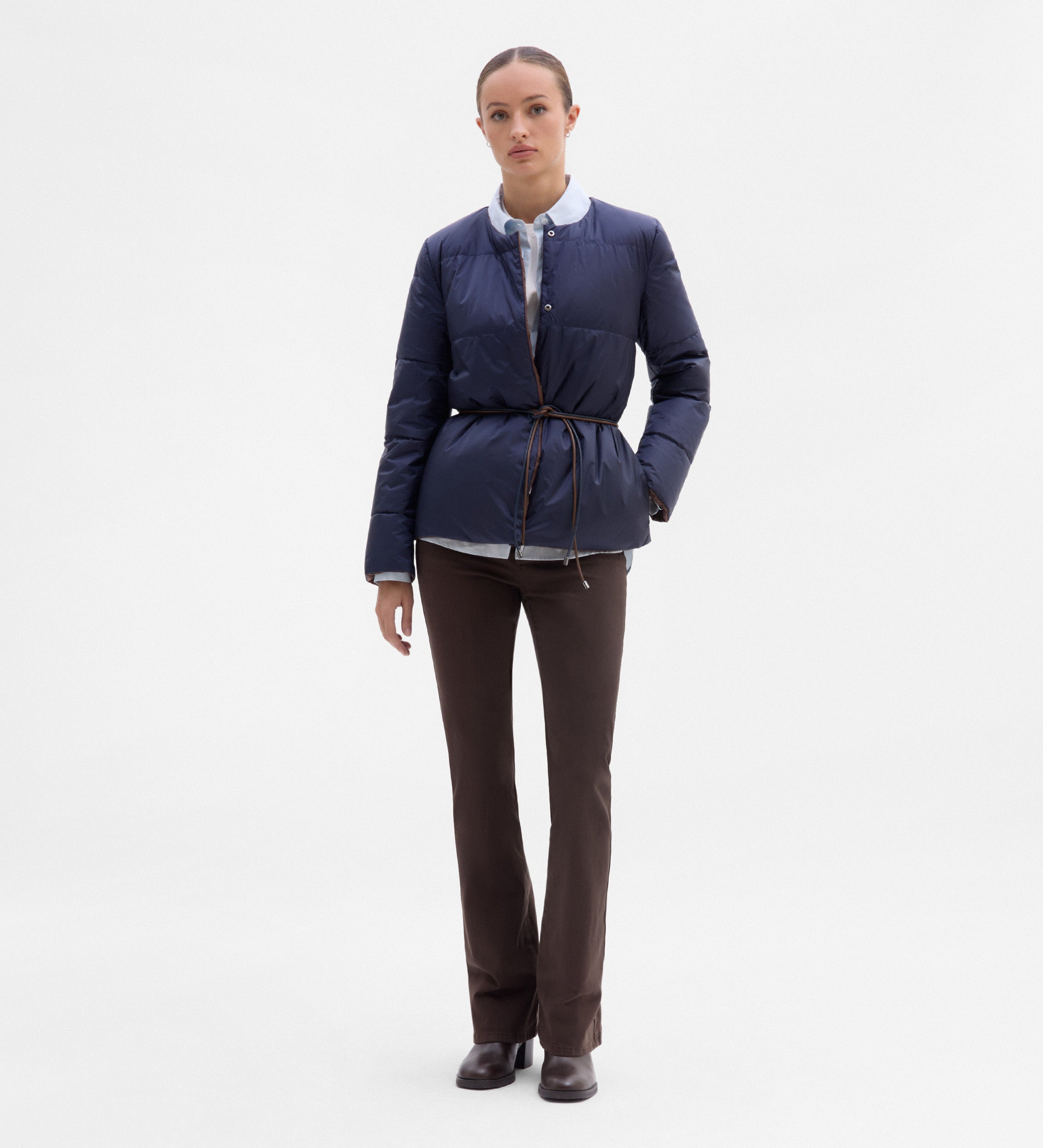 Plumífero reversible cinturón