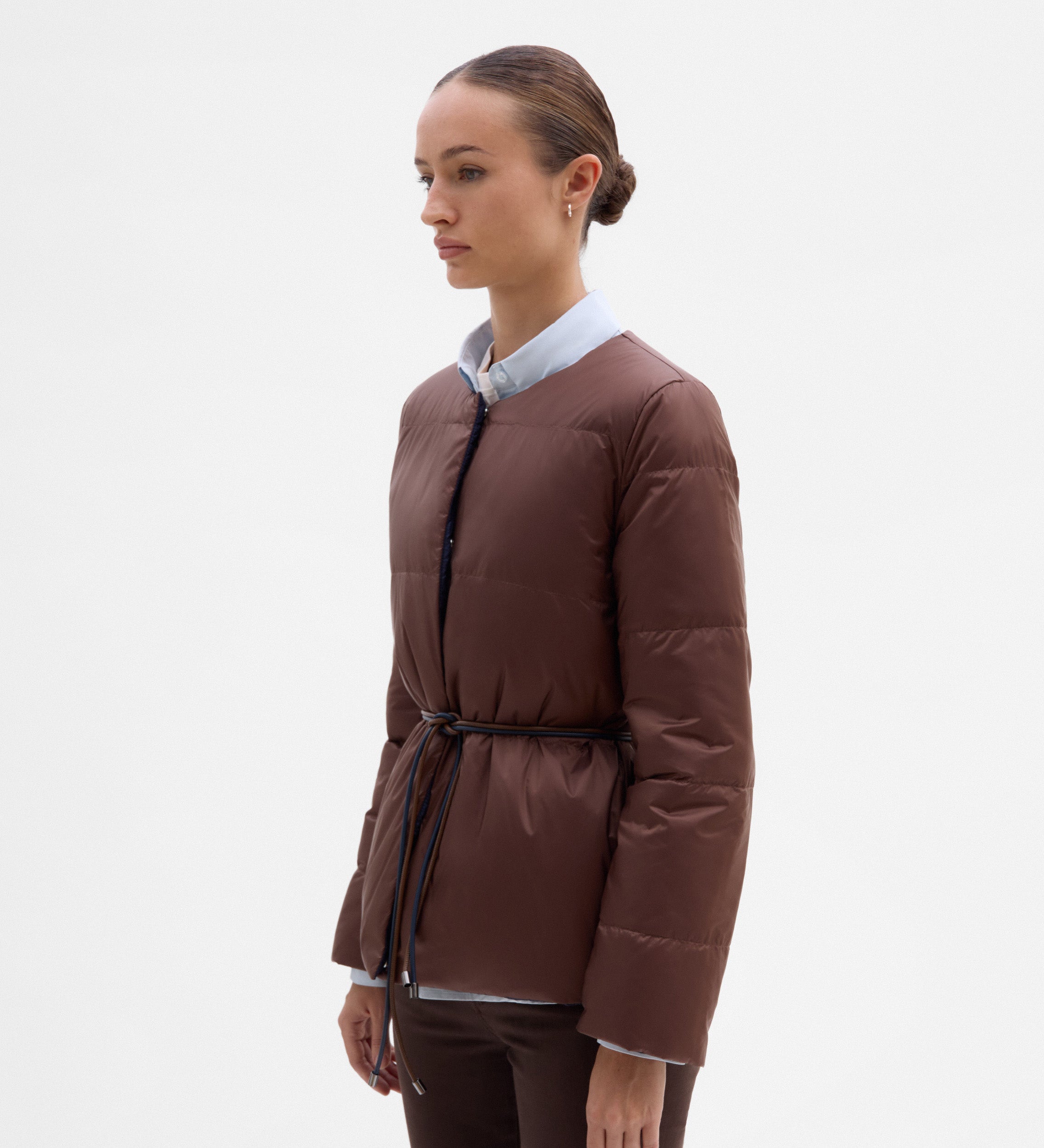 Plumífero reversible cinturón