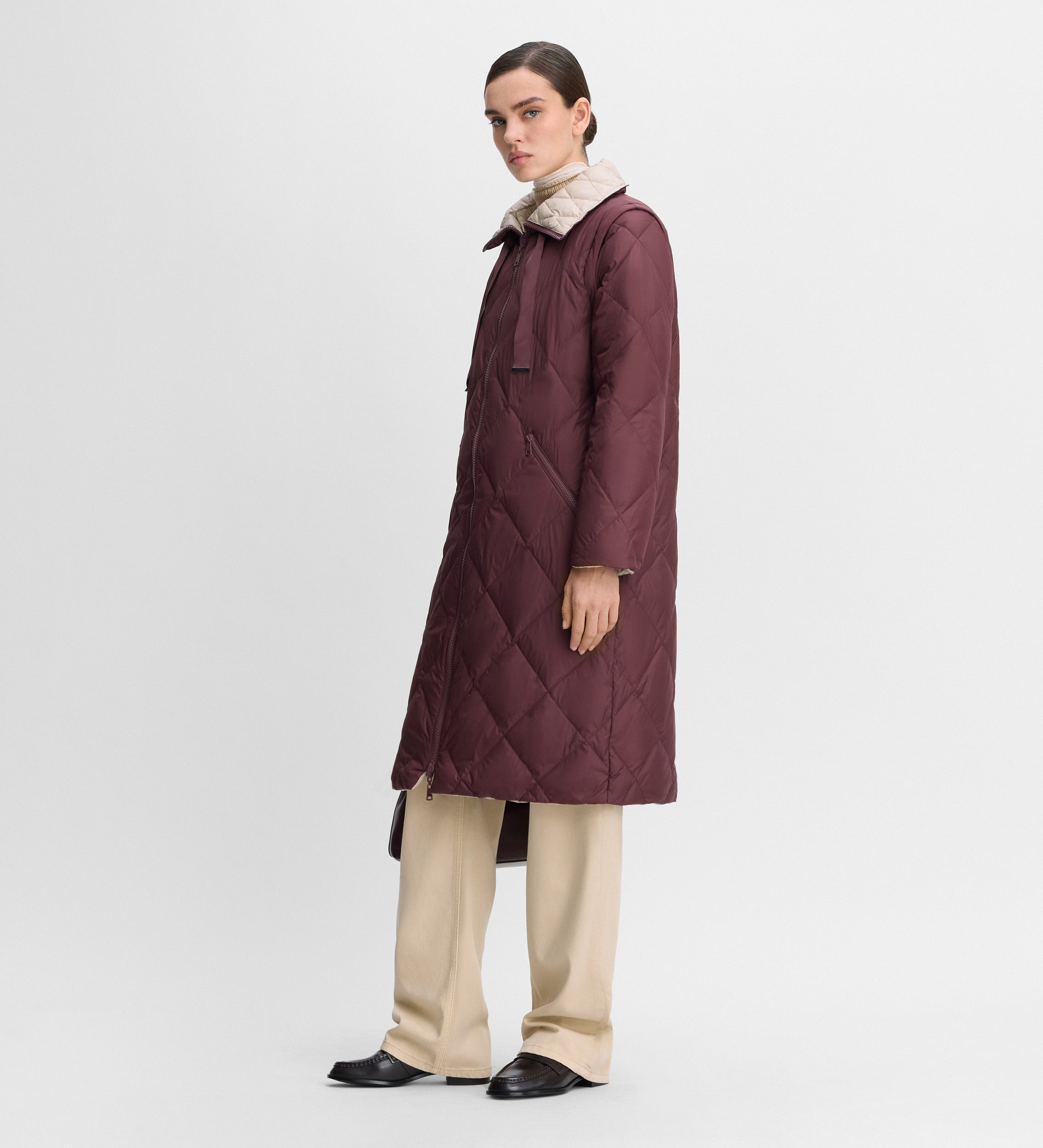 Plumífero largo reversible