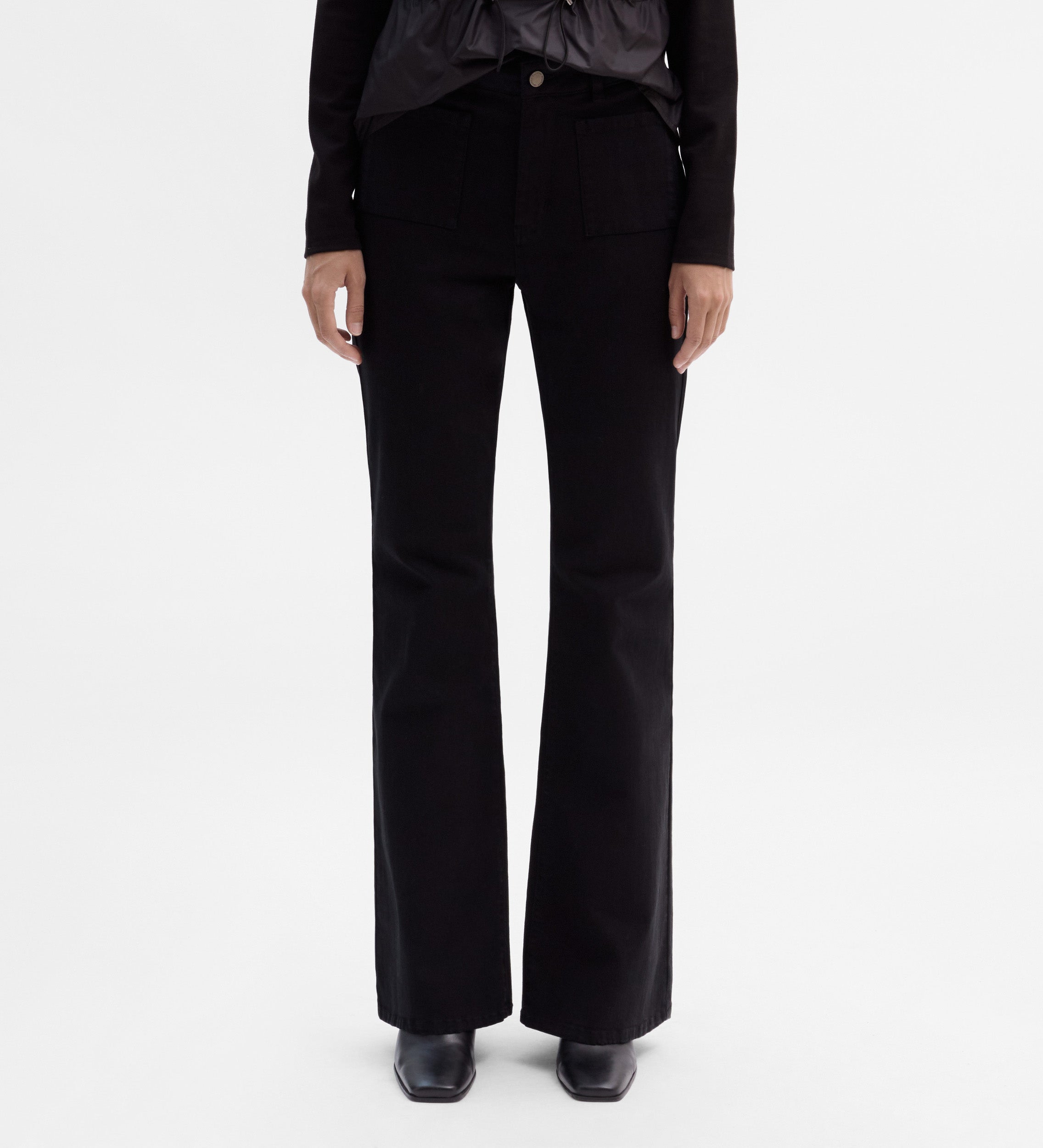 Pantalón bolsillos parche