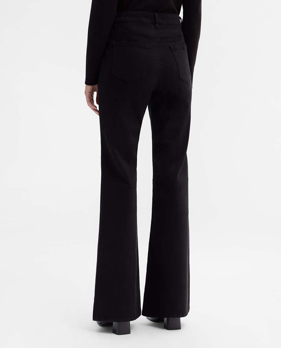 Pantalón bolsillos parche