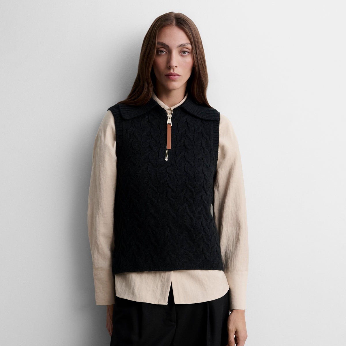 Gilet tricoté avec tresses