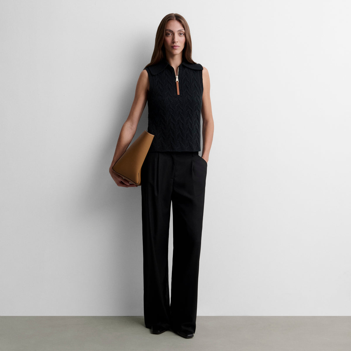 Gilet tricoté avec tresses