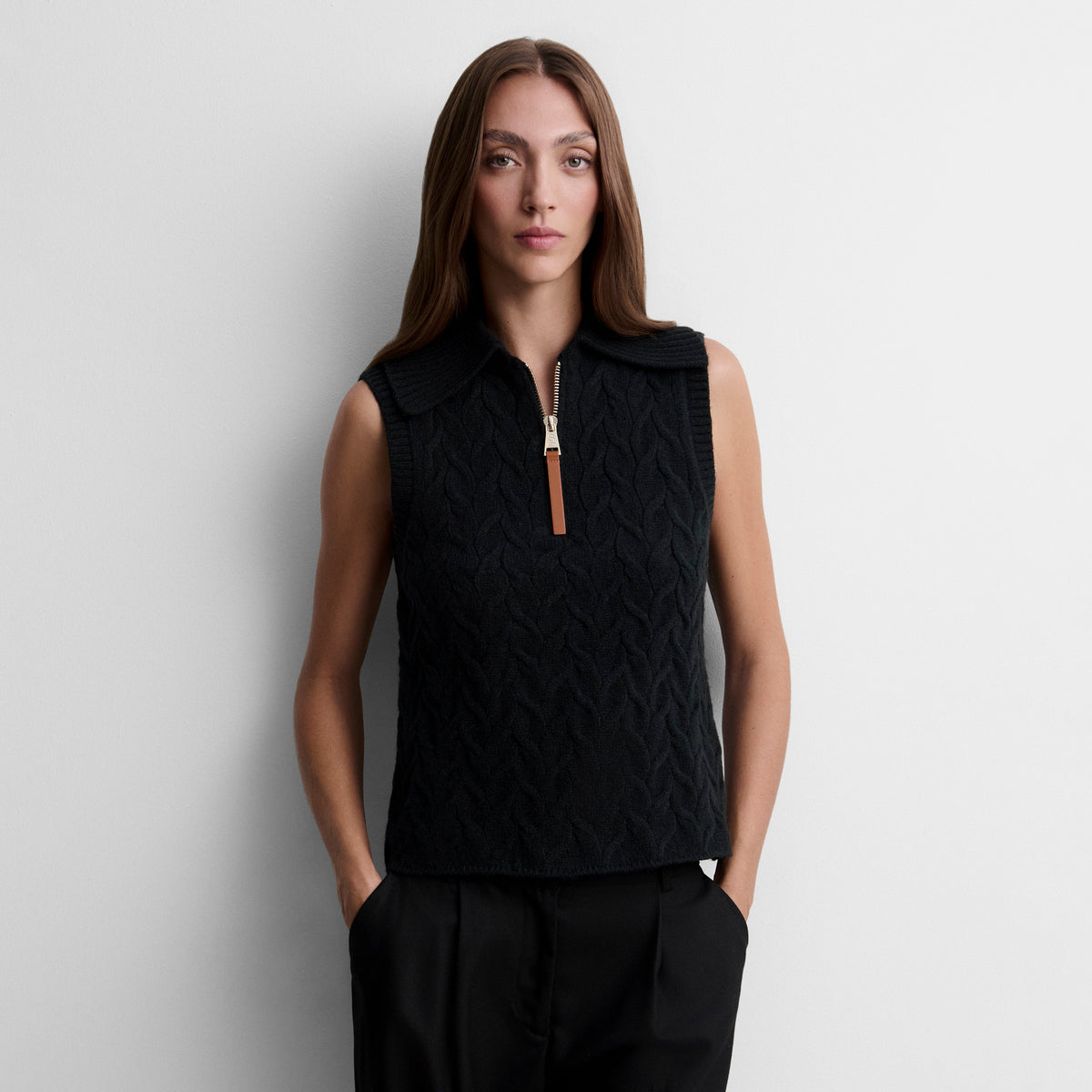 Gilet tricoté avec tresses