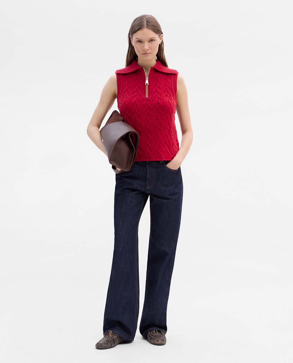 Knitted vest with braids