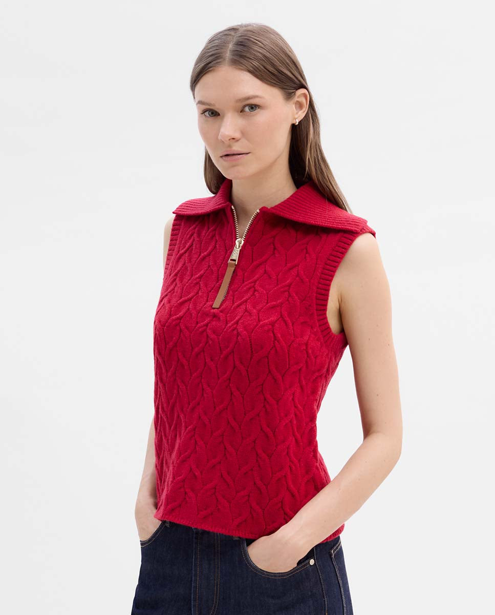 Knitted vest with braids