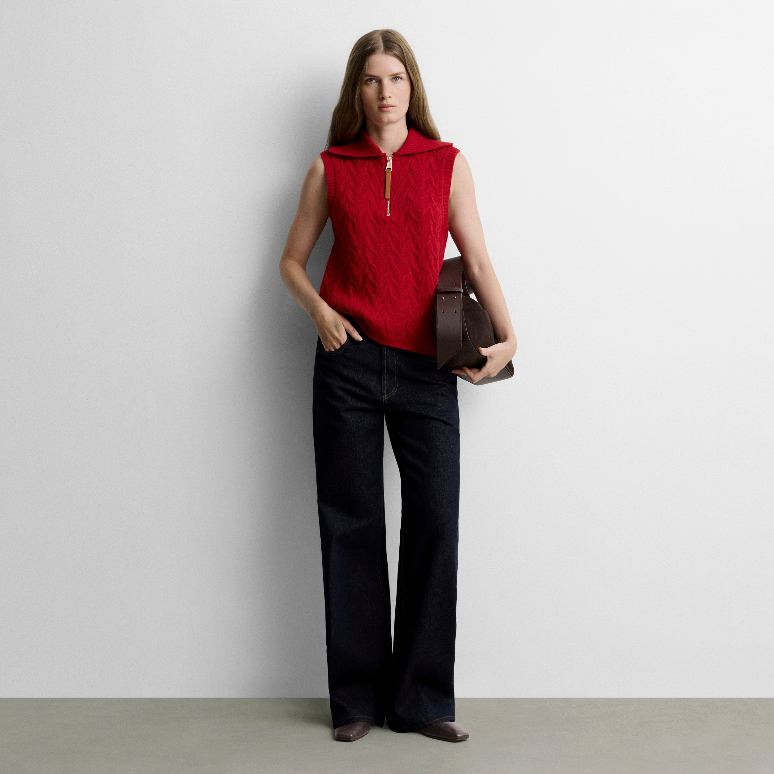 Knitted vest with braids