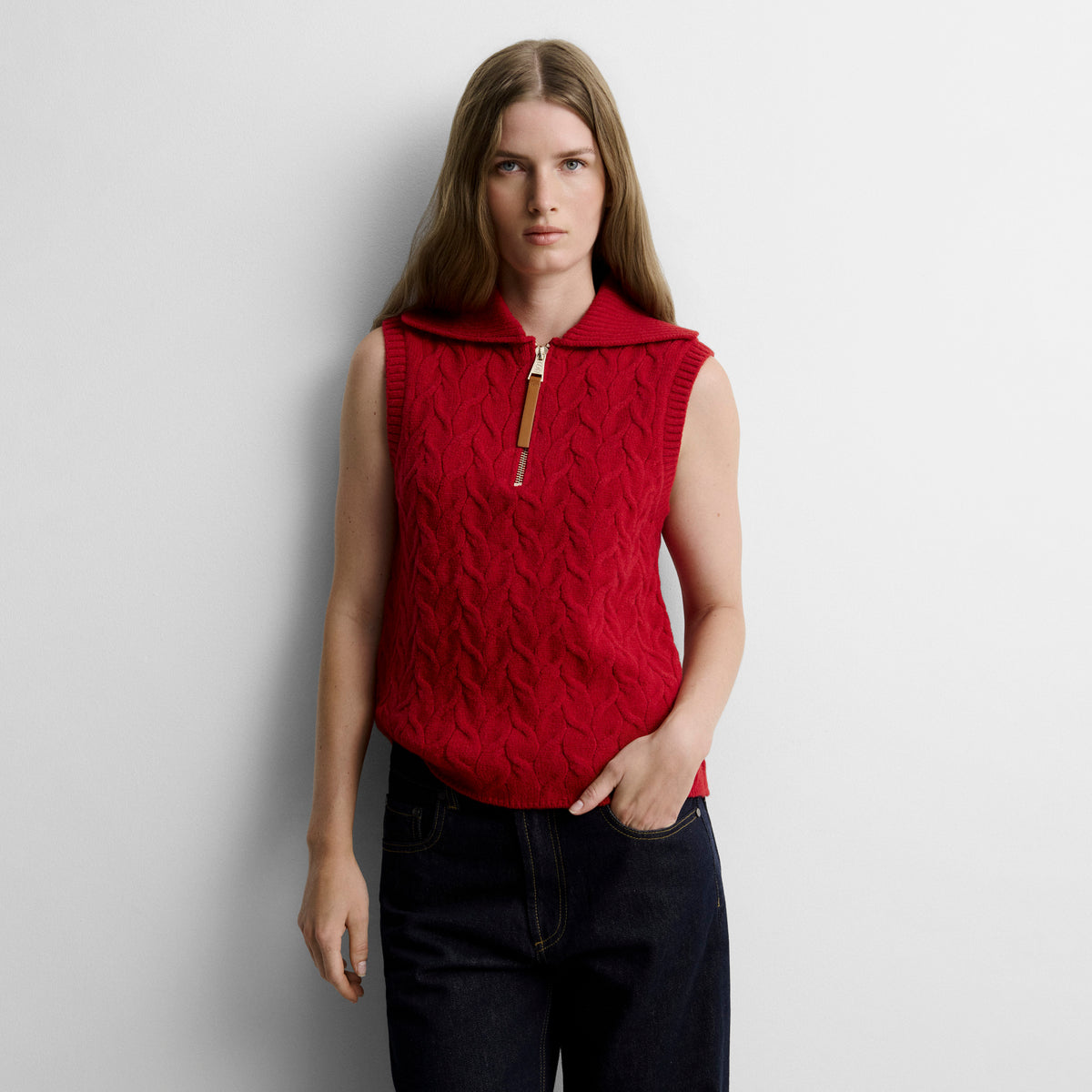Knitted vest with braids