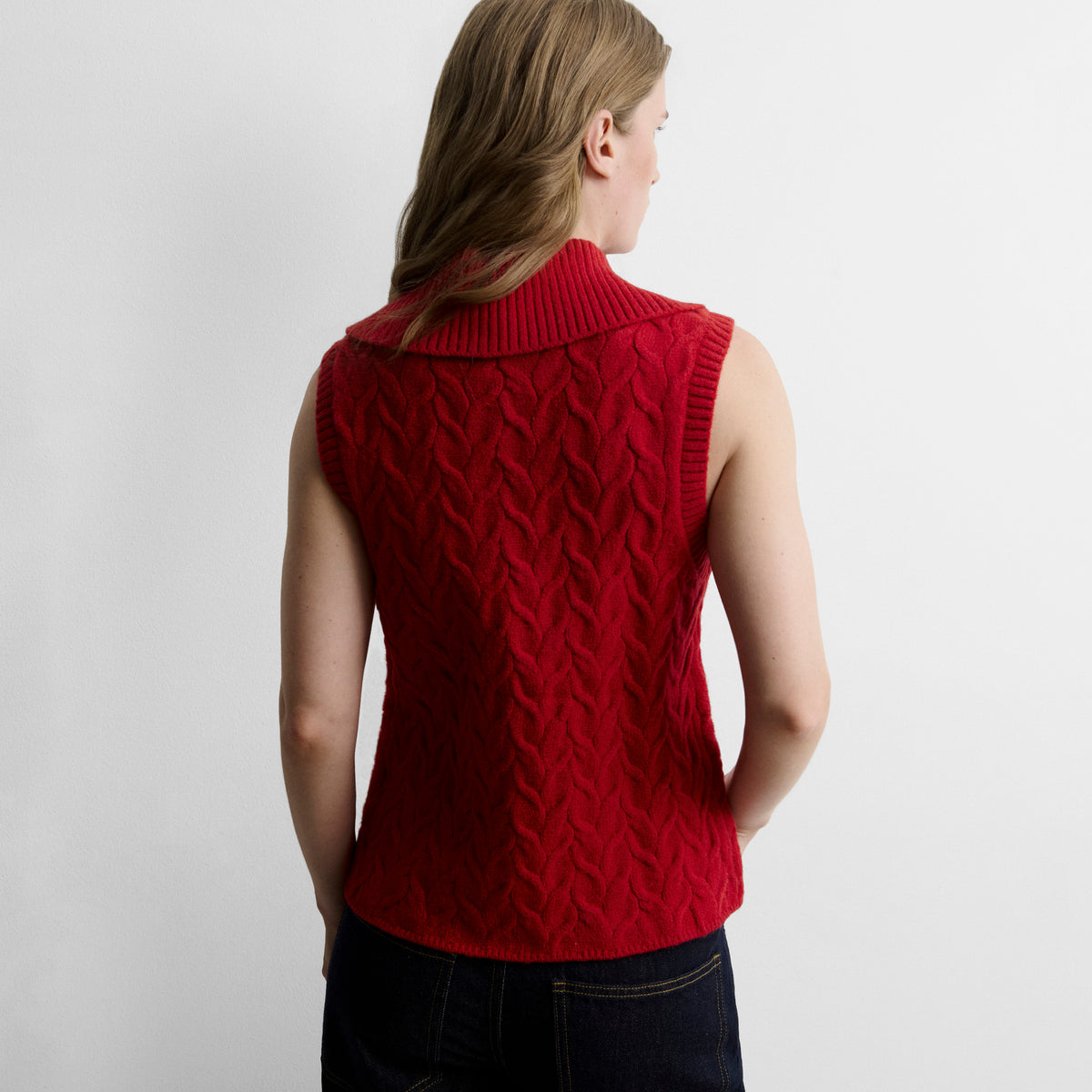 Knitted vest with braids