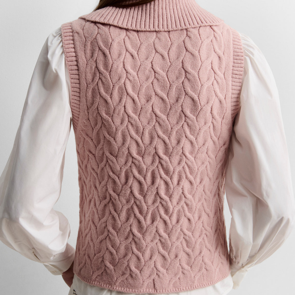 Gilet tricoté tresses