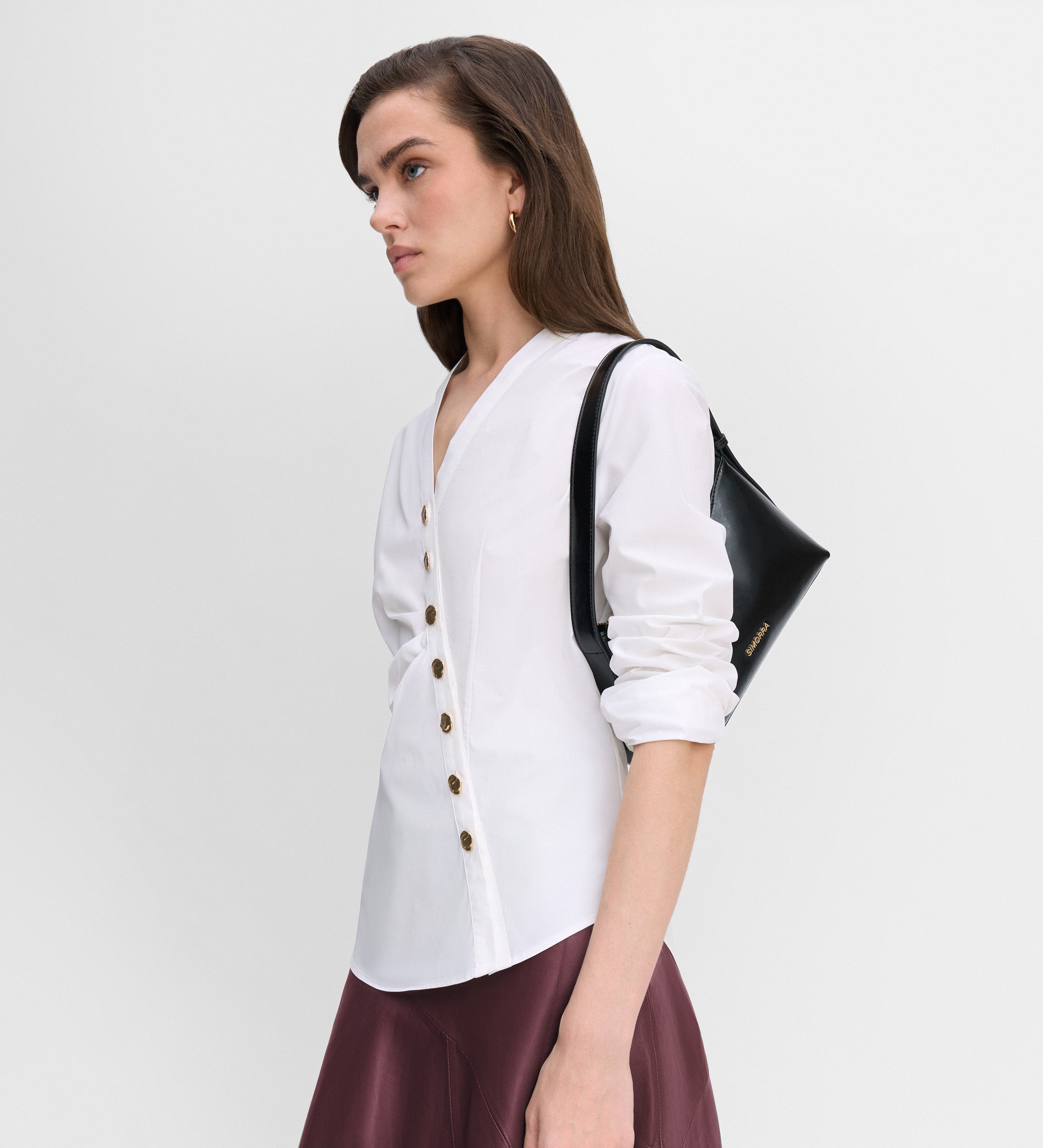 Blusa entallada botones