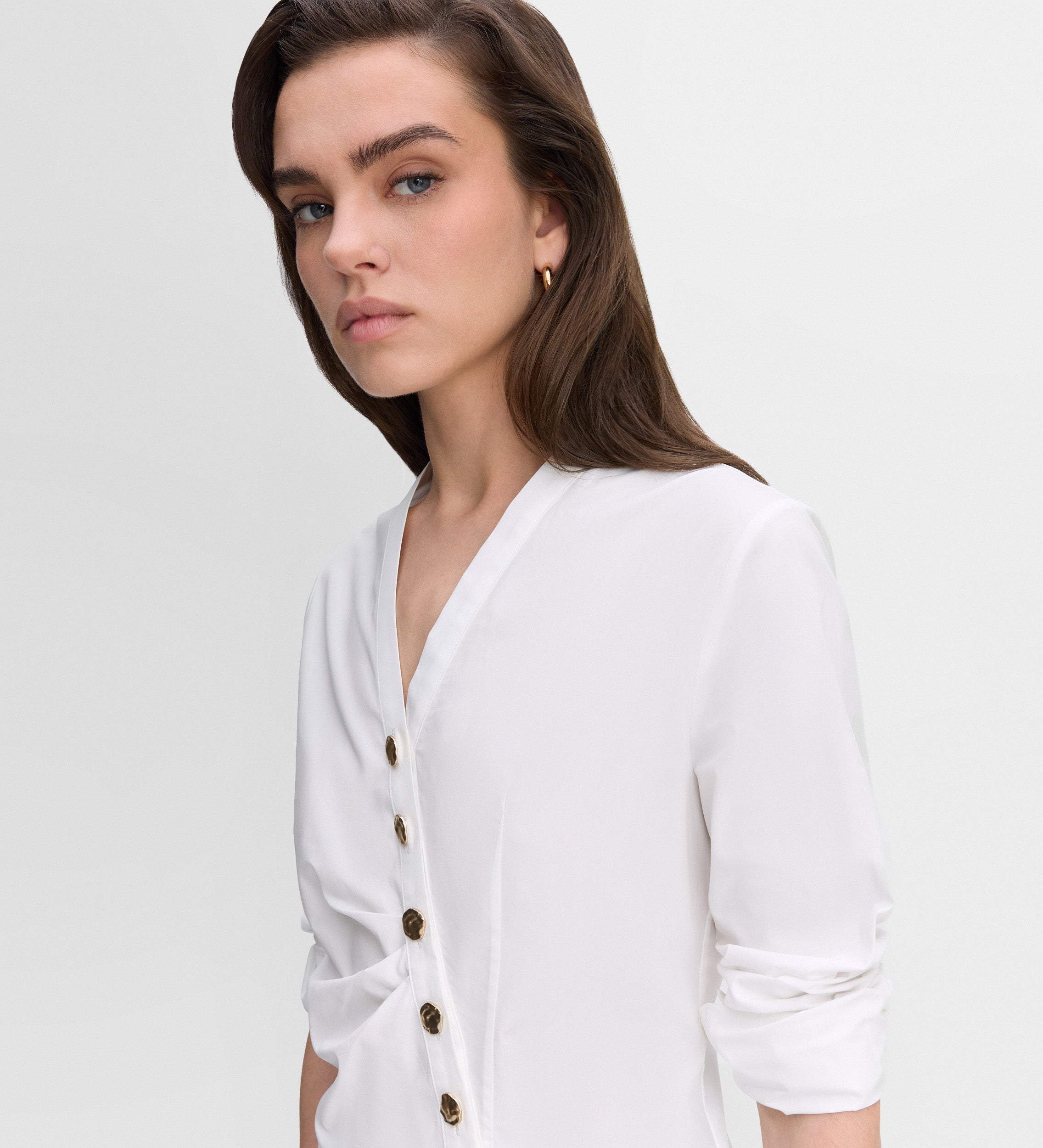 Blusa entallada botones