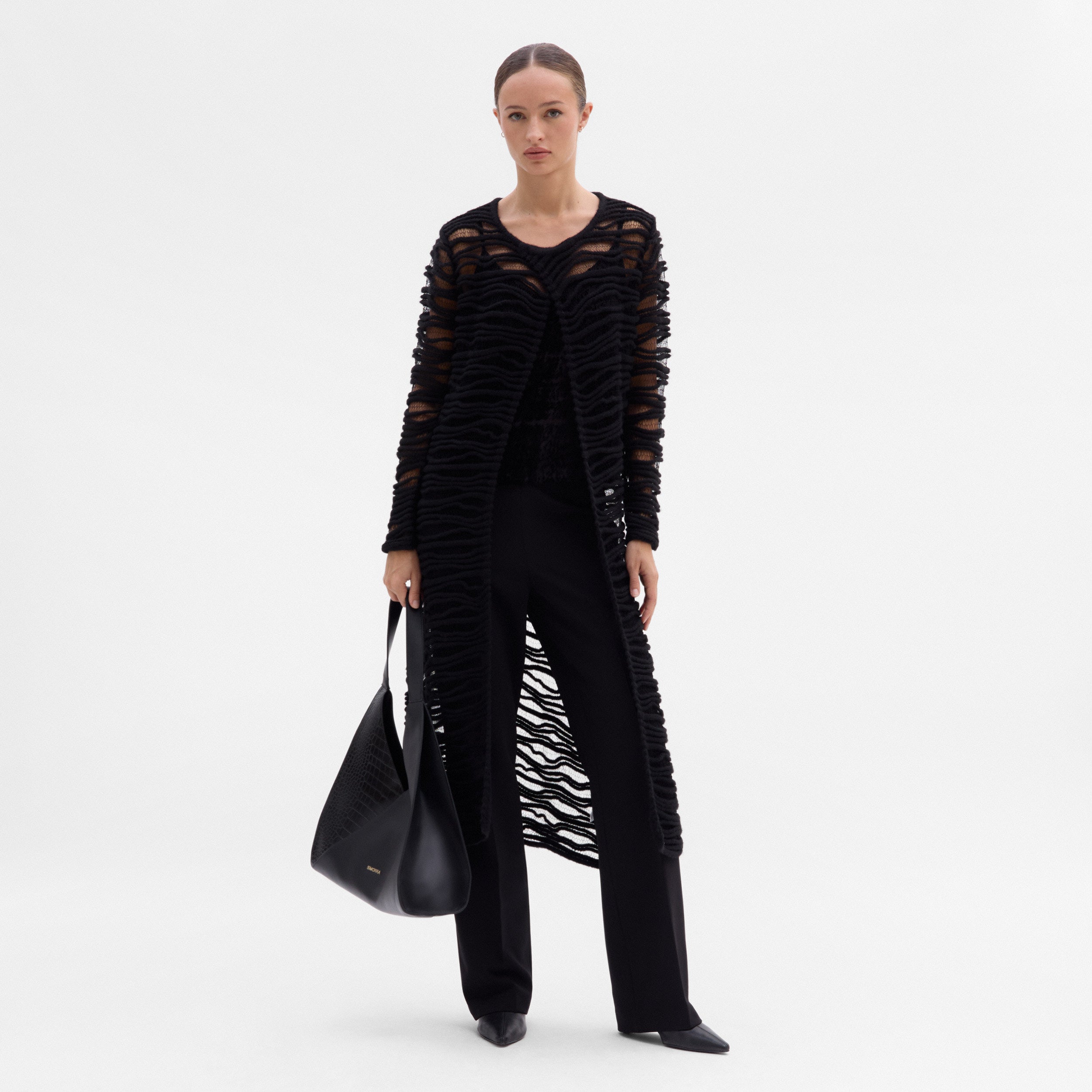 Long fantasy knit vest