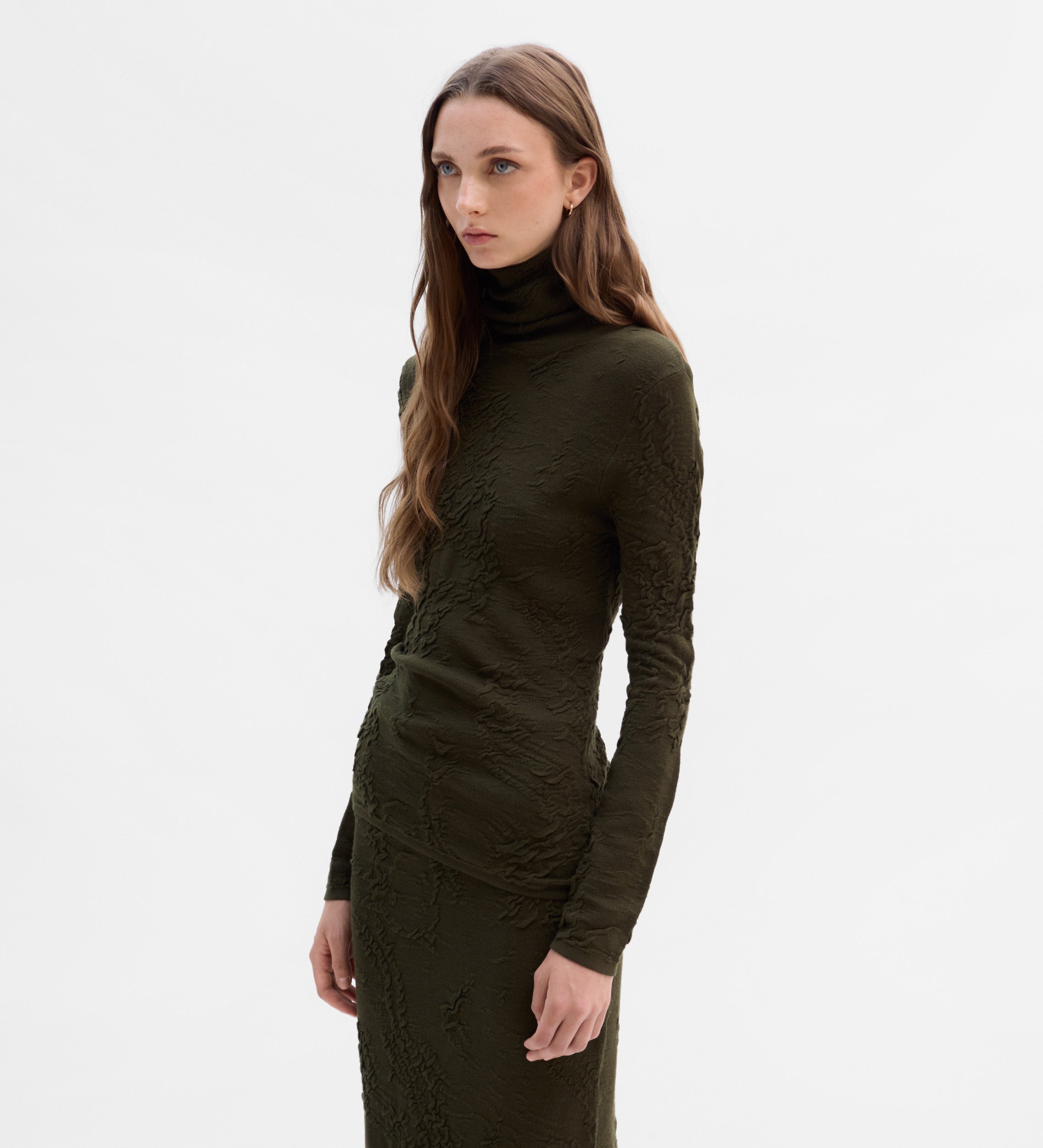 Jersey cuello alto textura