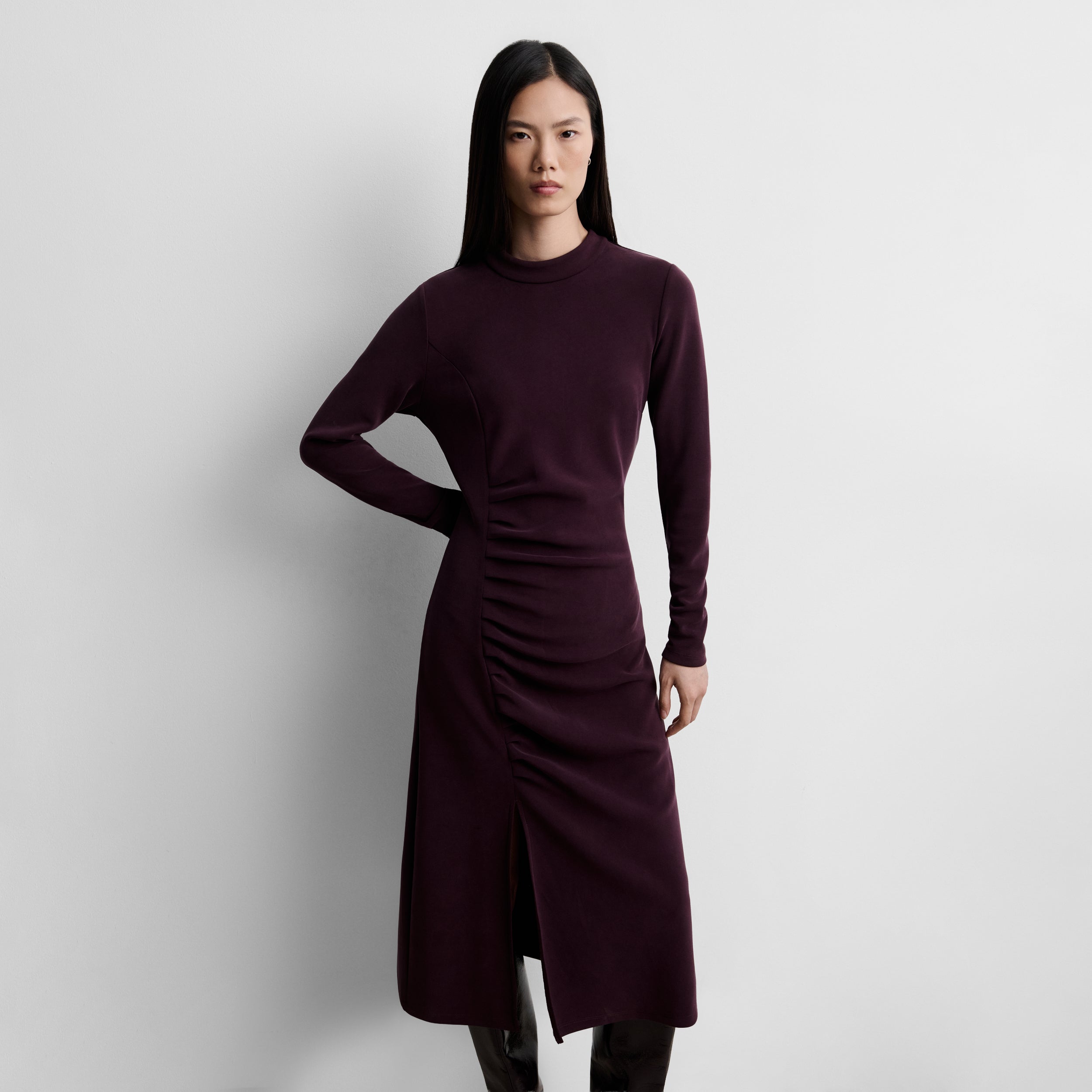 Dress with side draping