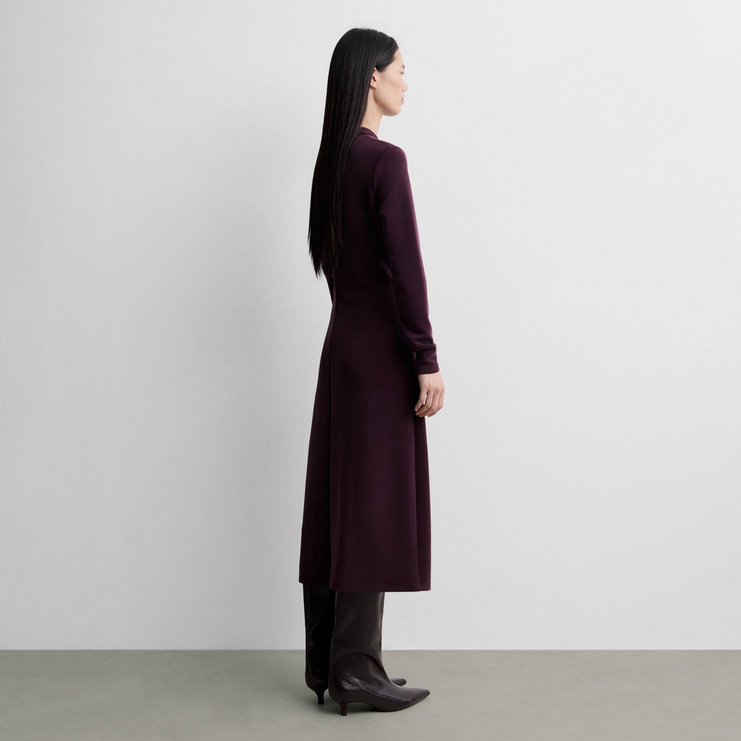 Dress with side draping