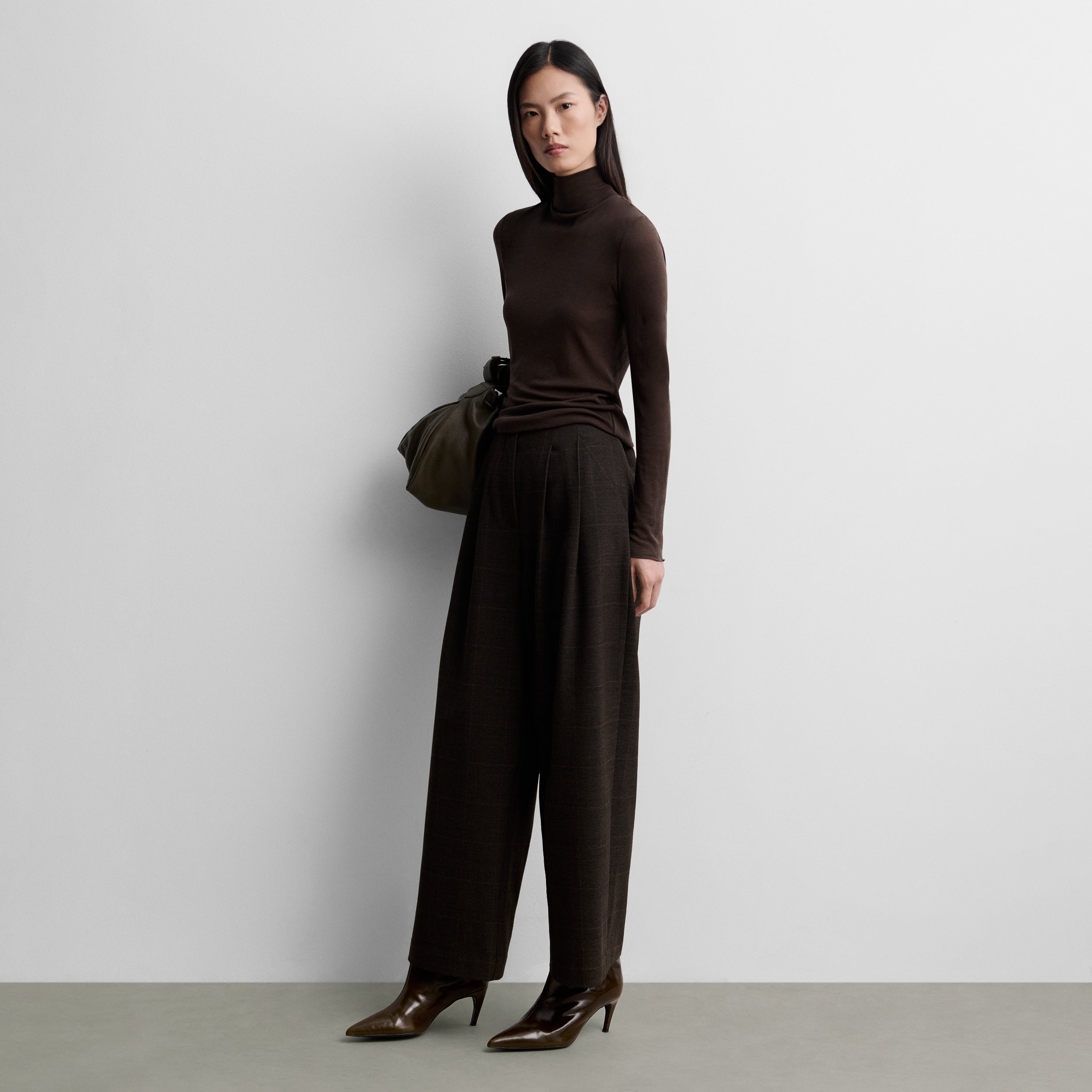 Checked trousers with darts