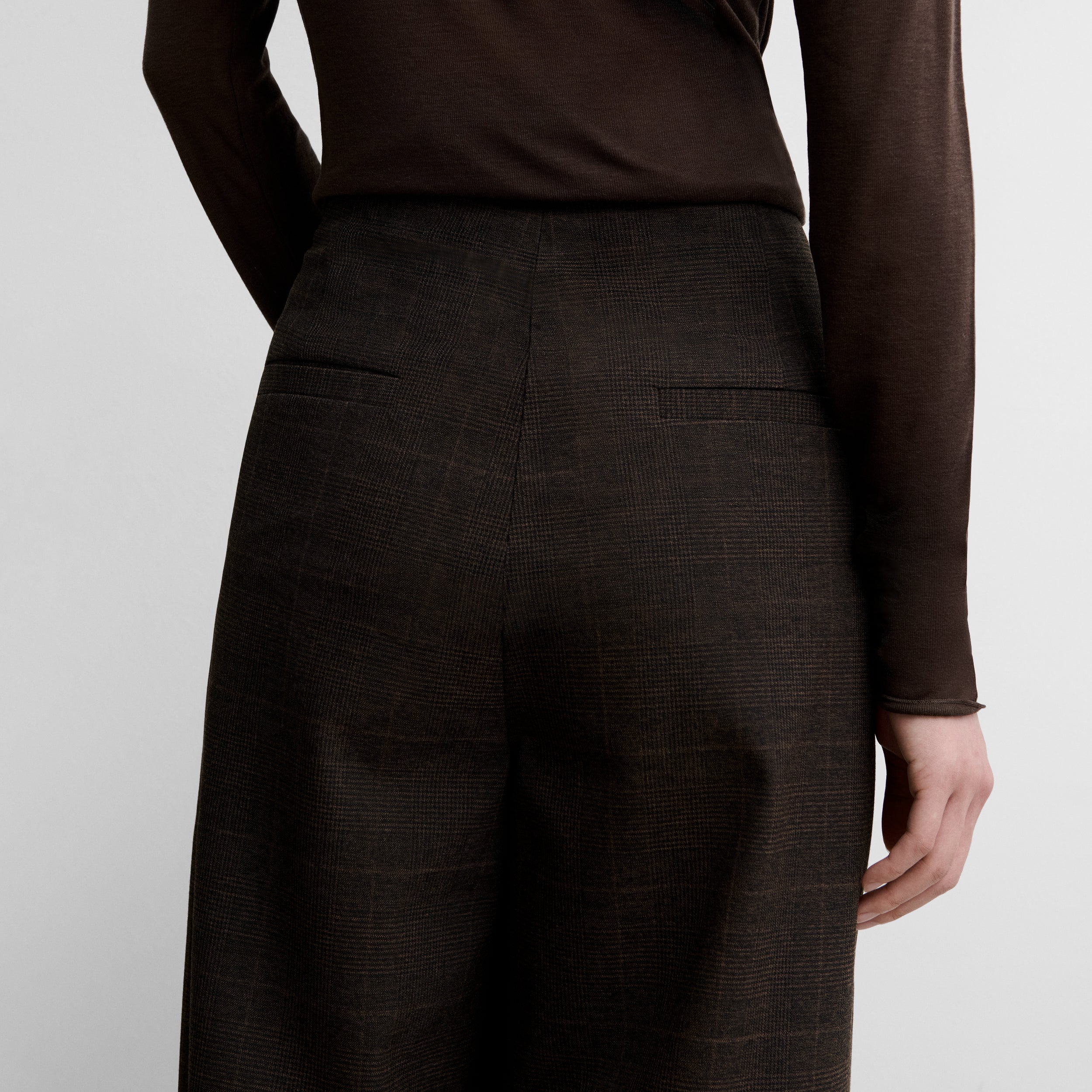 Checked trousers with darts