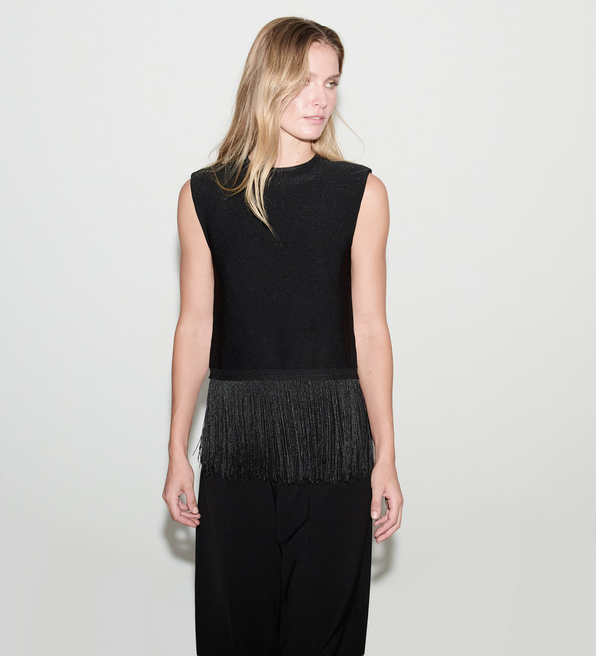 Top punto lurex flecos