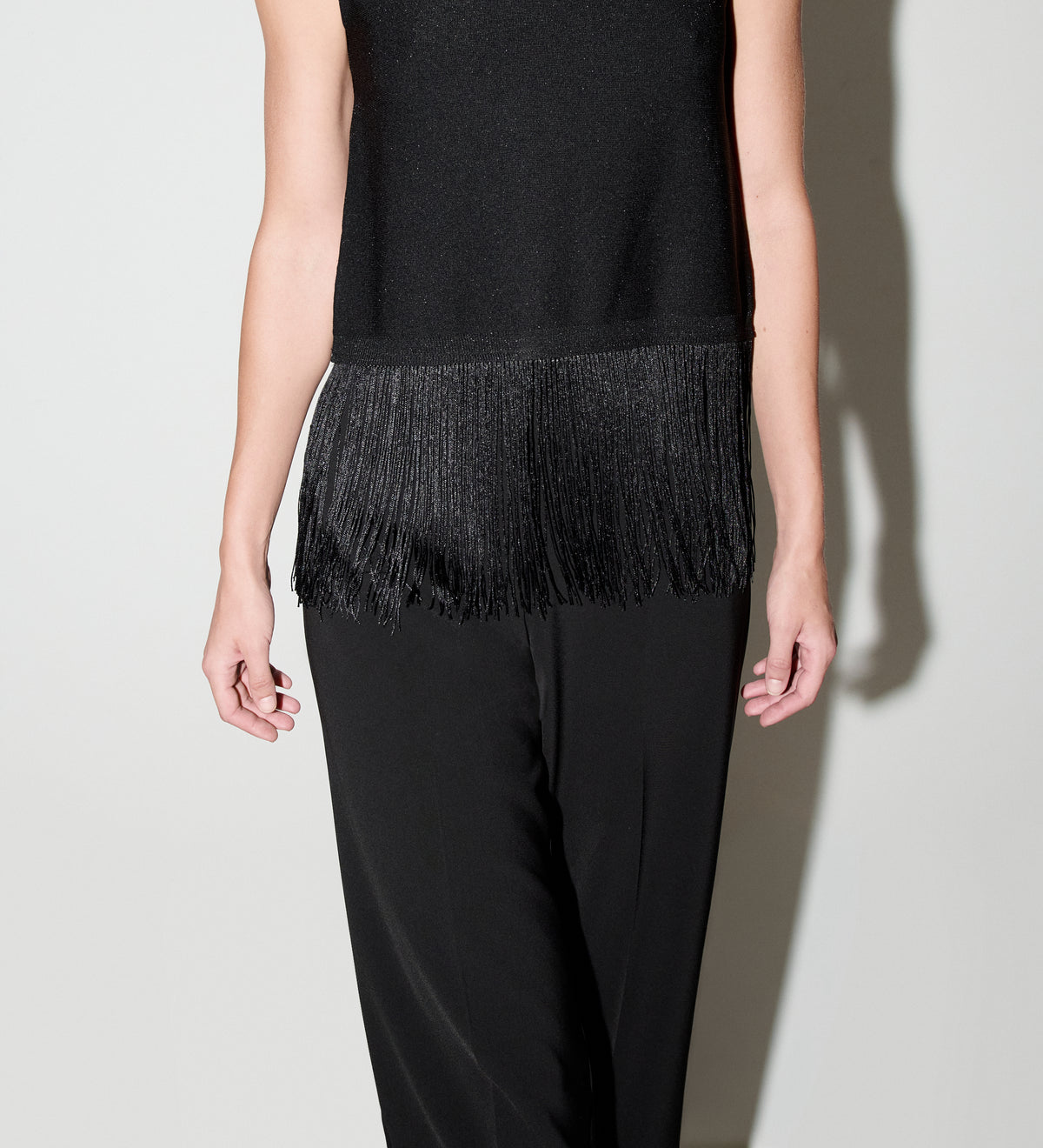 Top punto lurex flecos