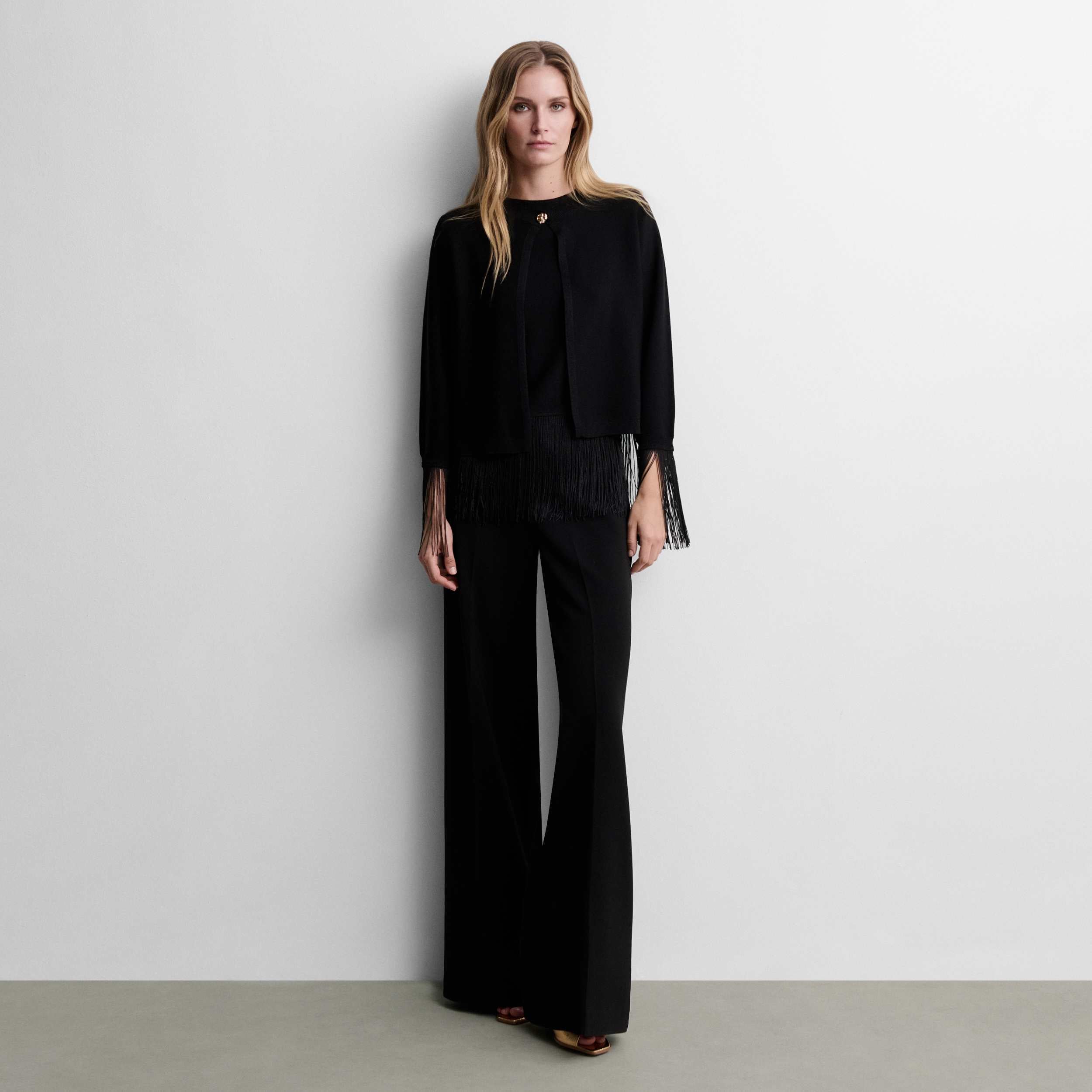 Bolero punto lurex flecos