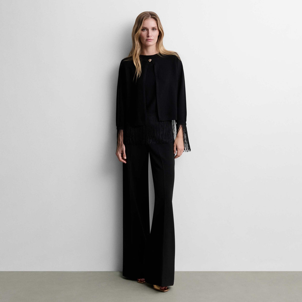 Bolero punto lurex flecos