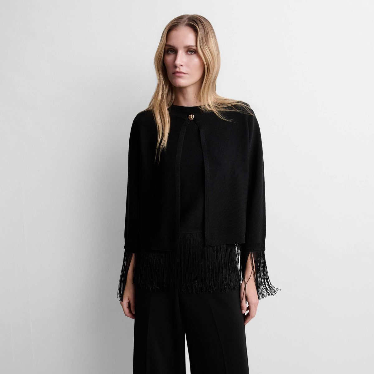 Bolero punto lurex flecos