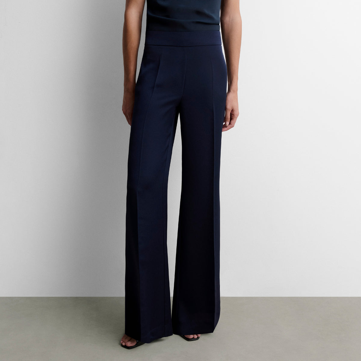 High-waisted flared trousers