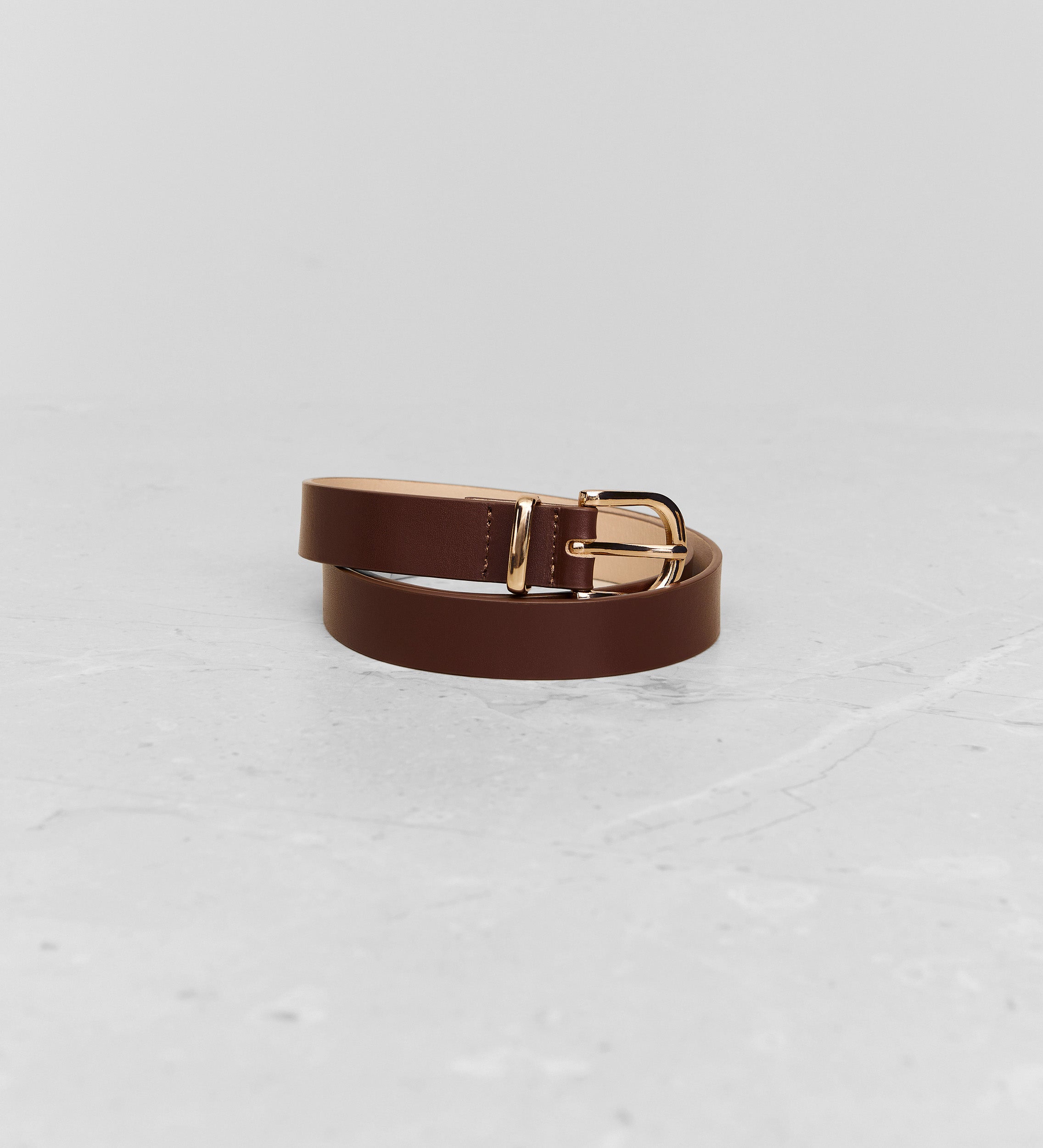 Leather belt with metal buckle