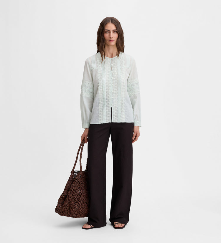 Blusa con pasamanerias