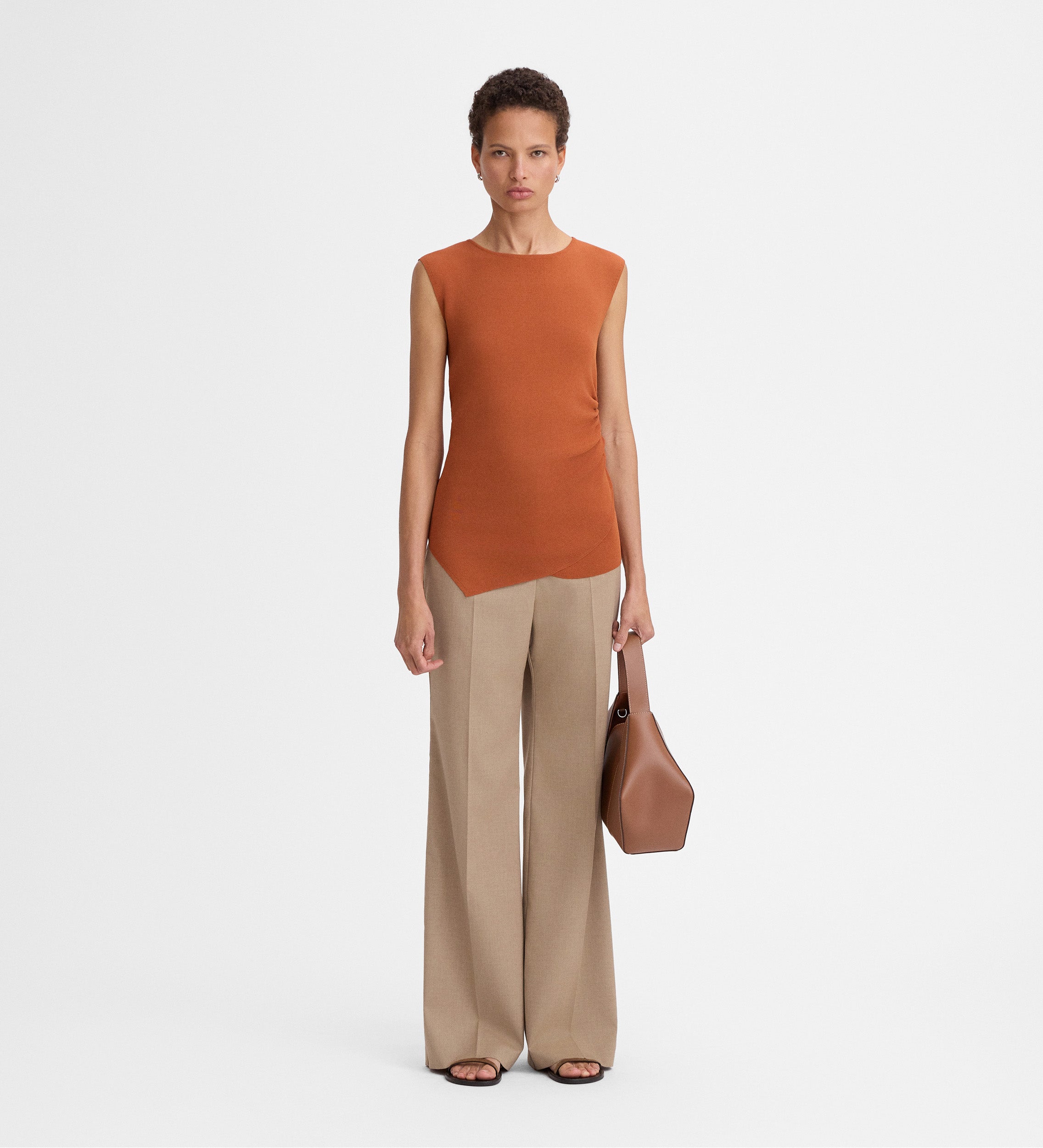 Top punto asimétrico