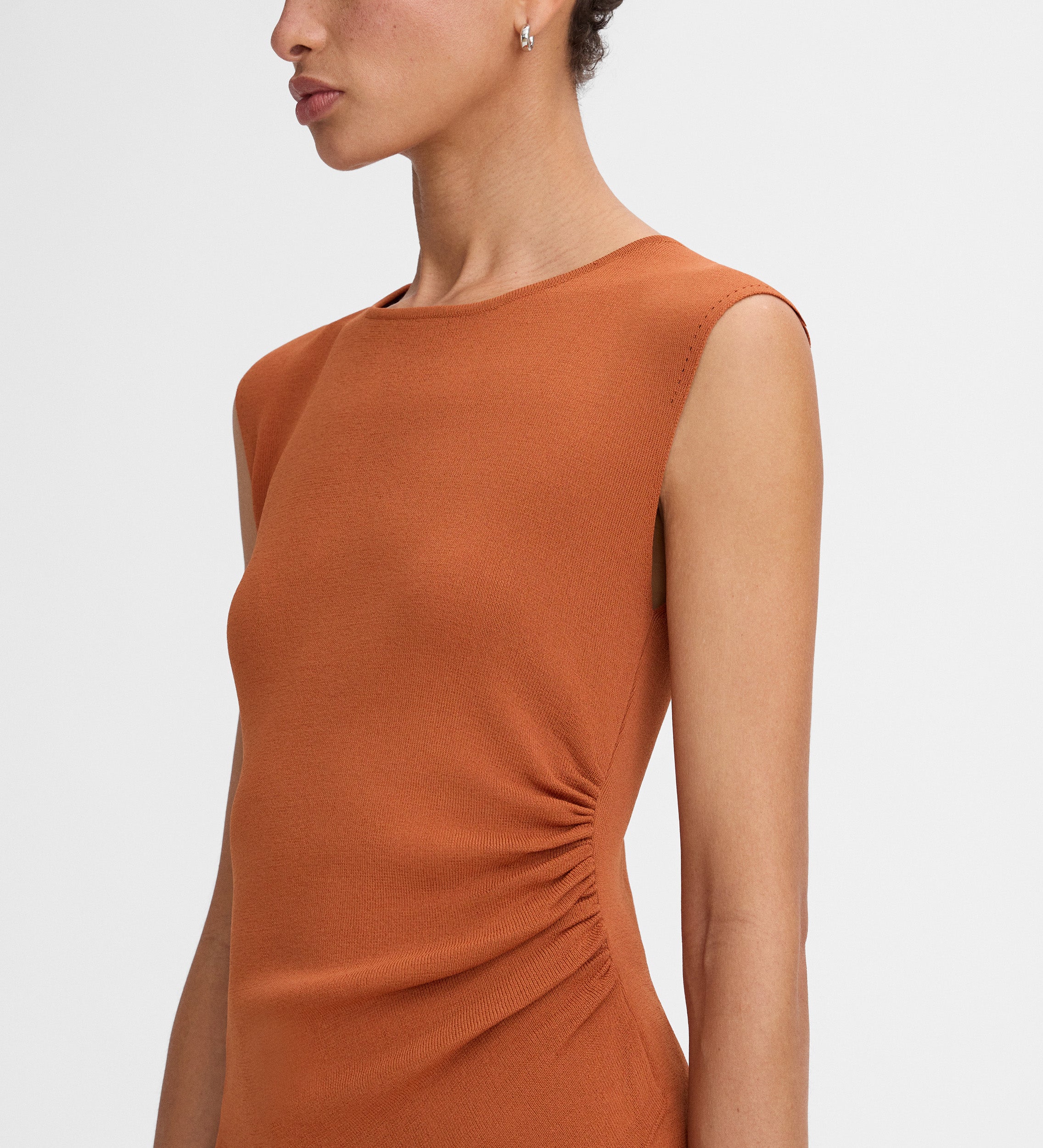 Top punto asimétrico