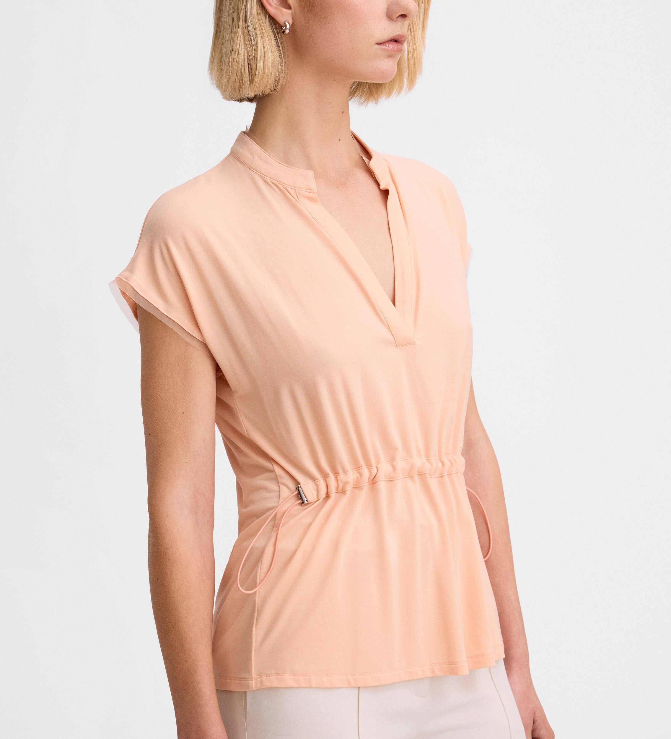 Camiseta con ceñidor