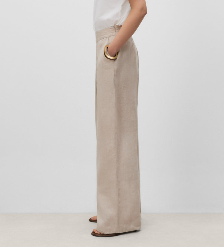 Trousers with stitched waistband