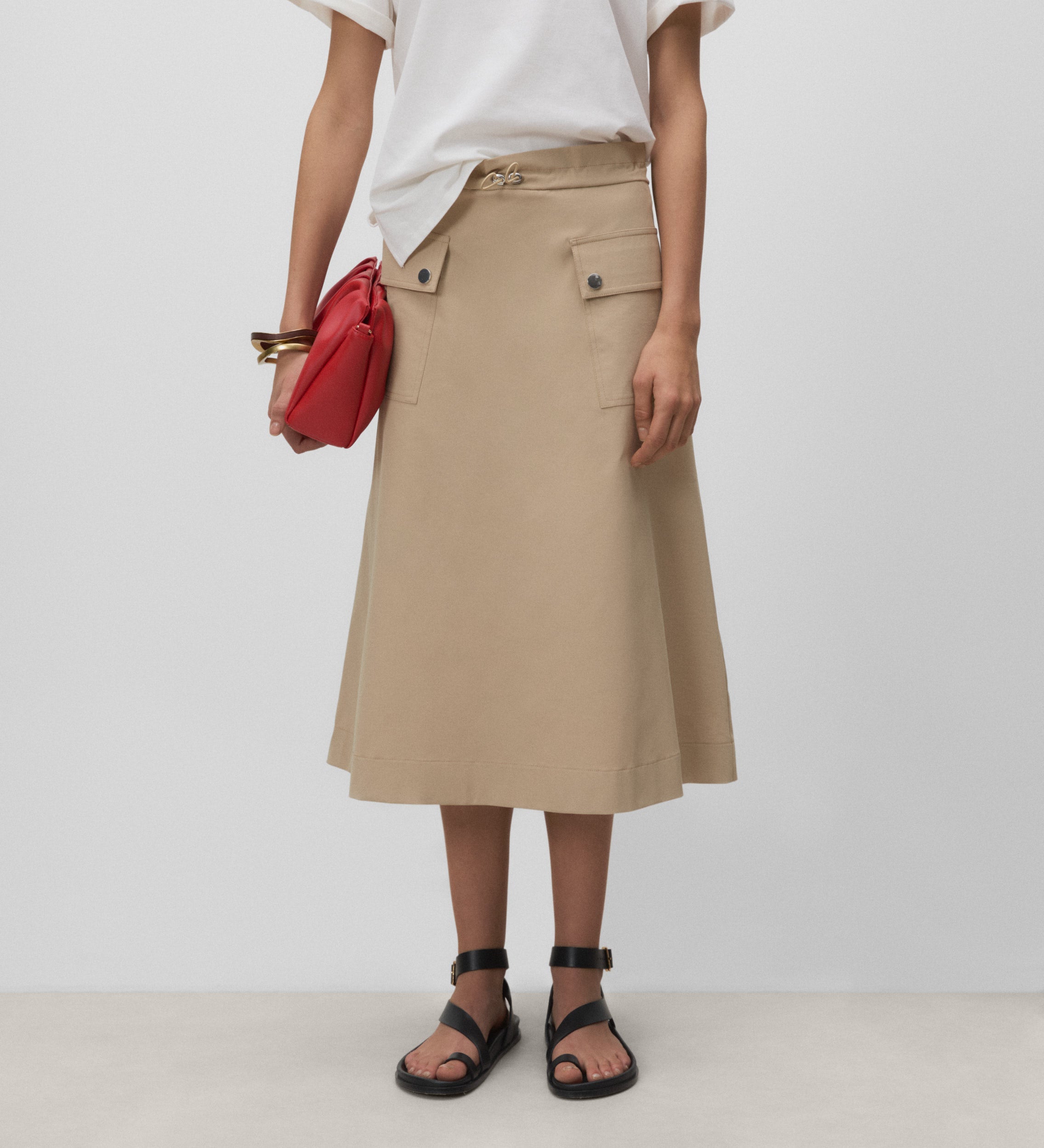 Technical skirt with pockets