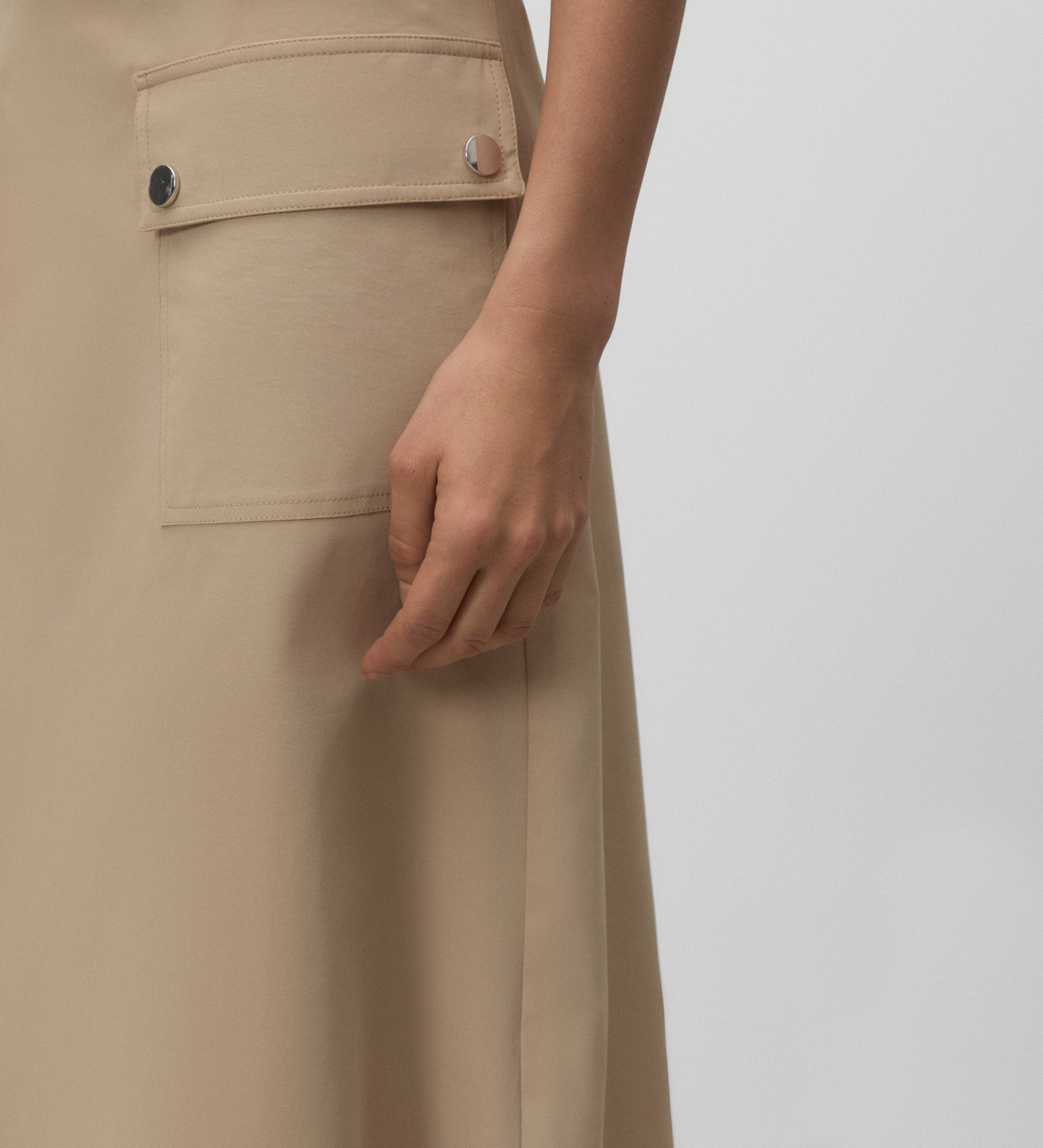 Technical skirt with pockets