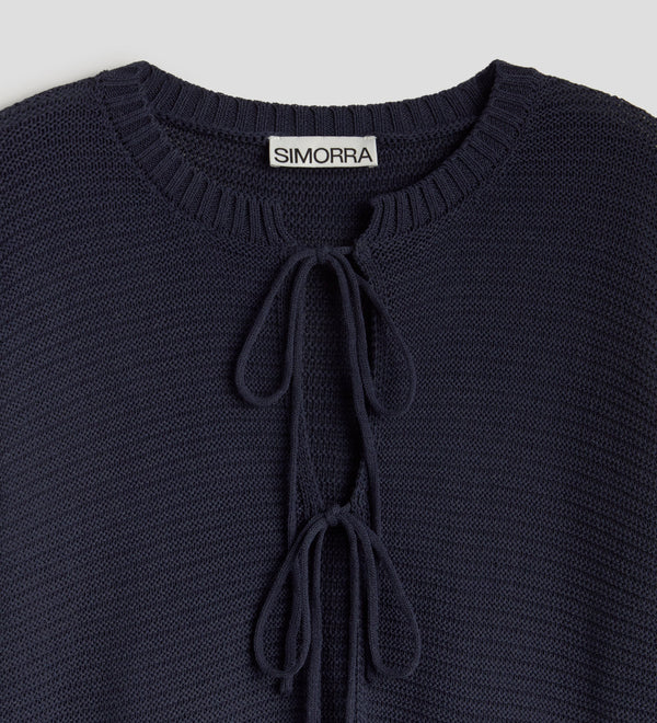 Short cardigan with bows