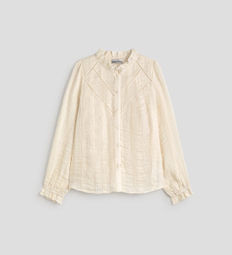 Blusa romántica textura