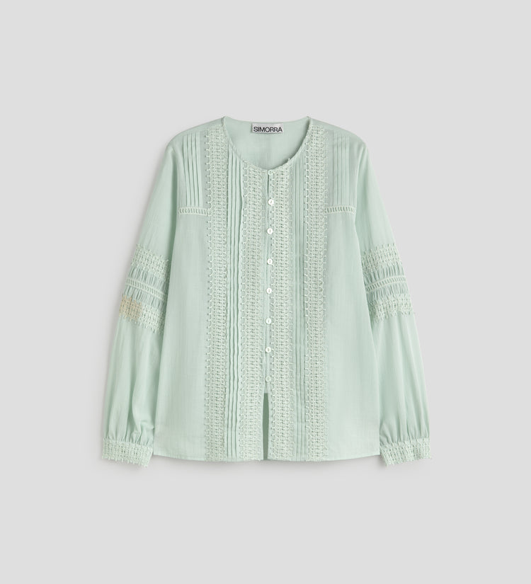 Blusa con pasamanerias