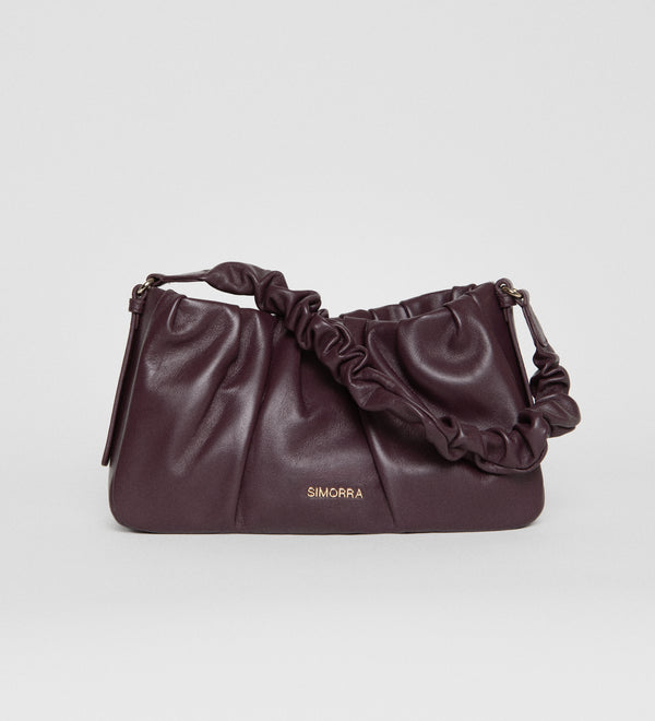 Bolso piel drapeado