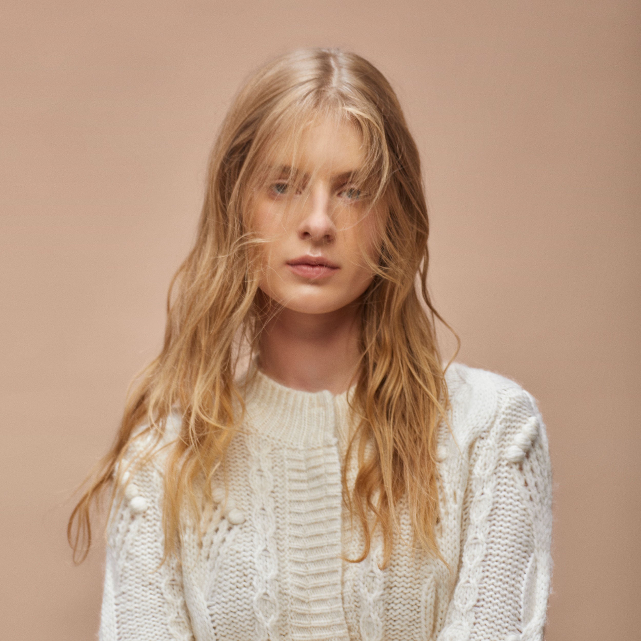 Abrigo tricot trenzado
