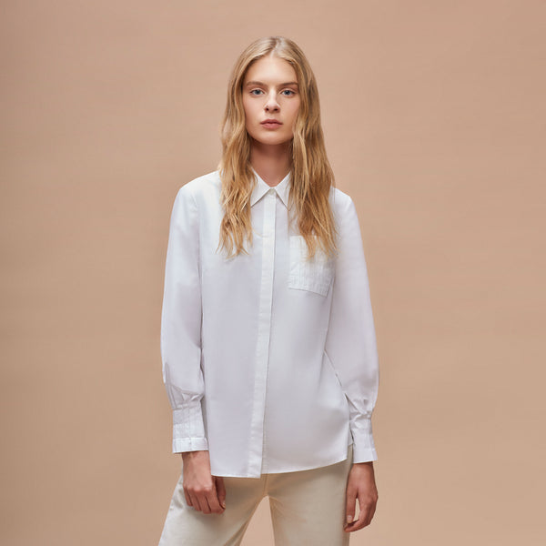 Shirt with pleated details