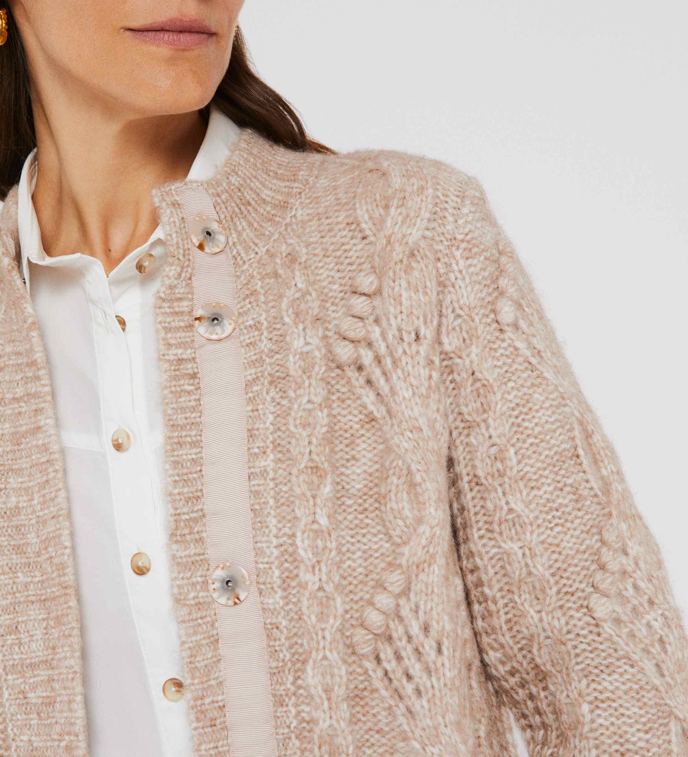 Abrigo tricot trenzado