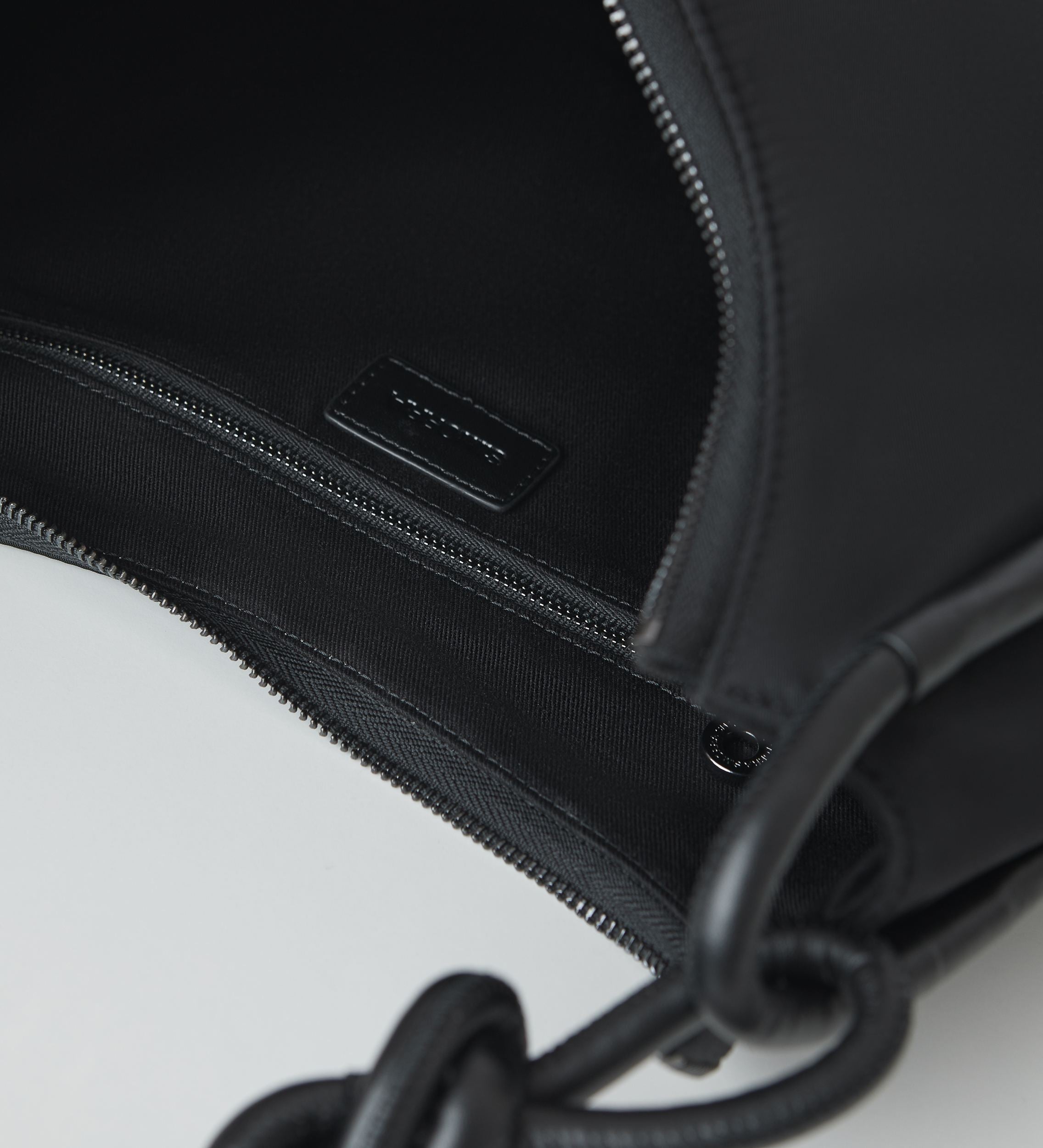 Technical and leather bag